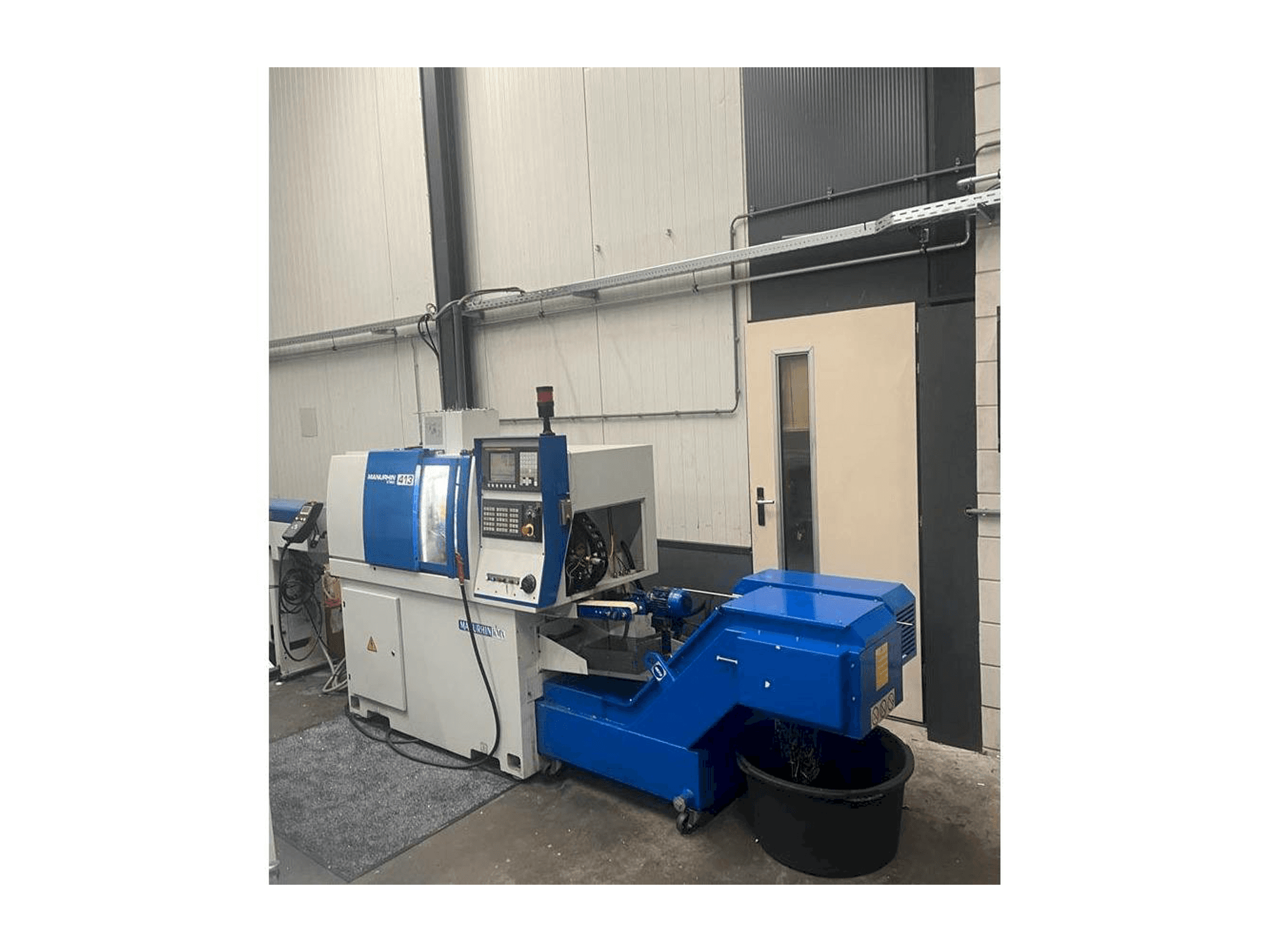 Вид станка Manurhin K'MX 413 спереди