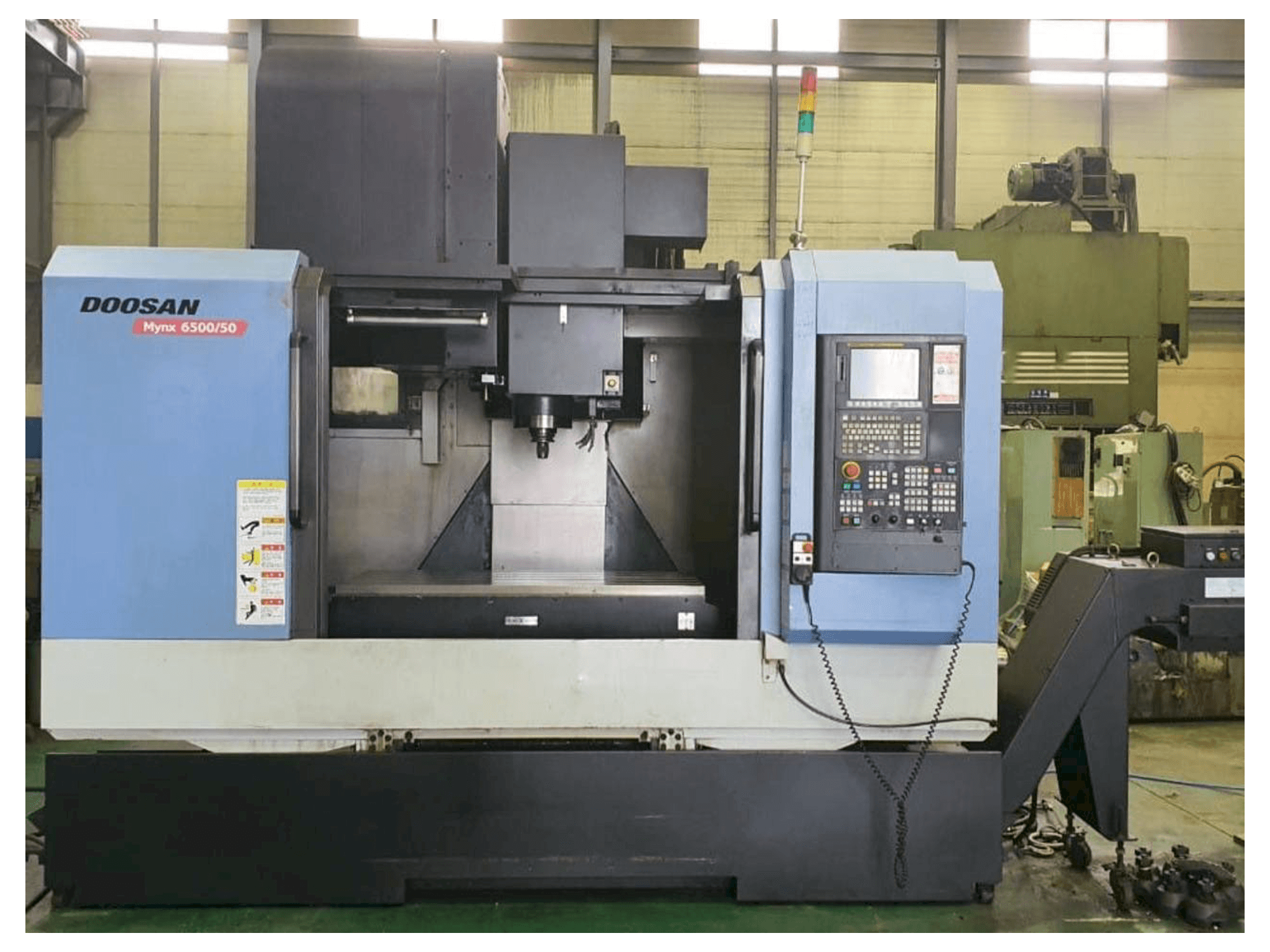 Вид станка Doosan Mynx 6500/50 спереди