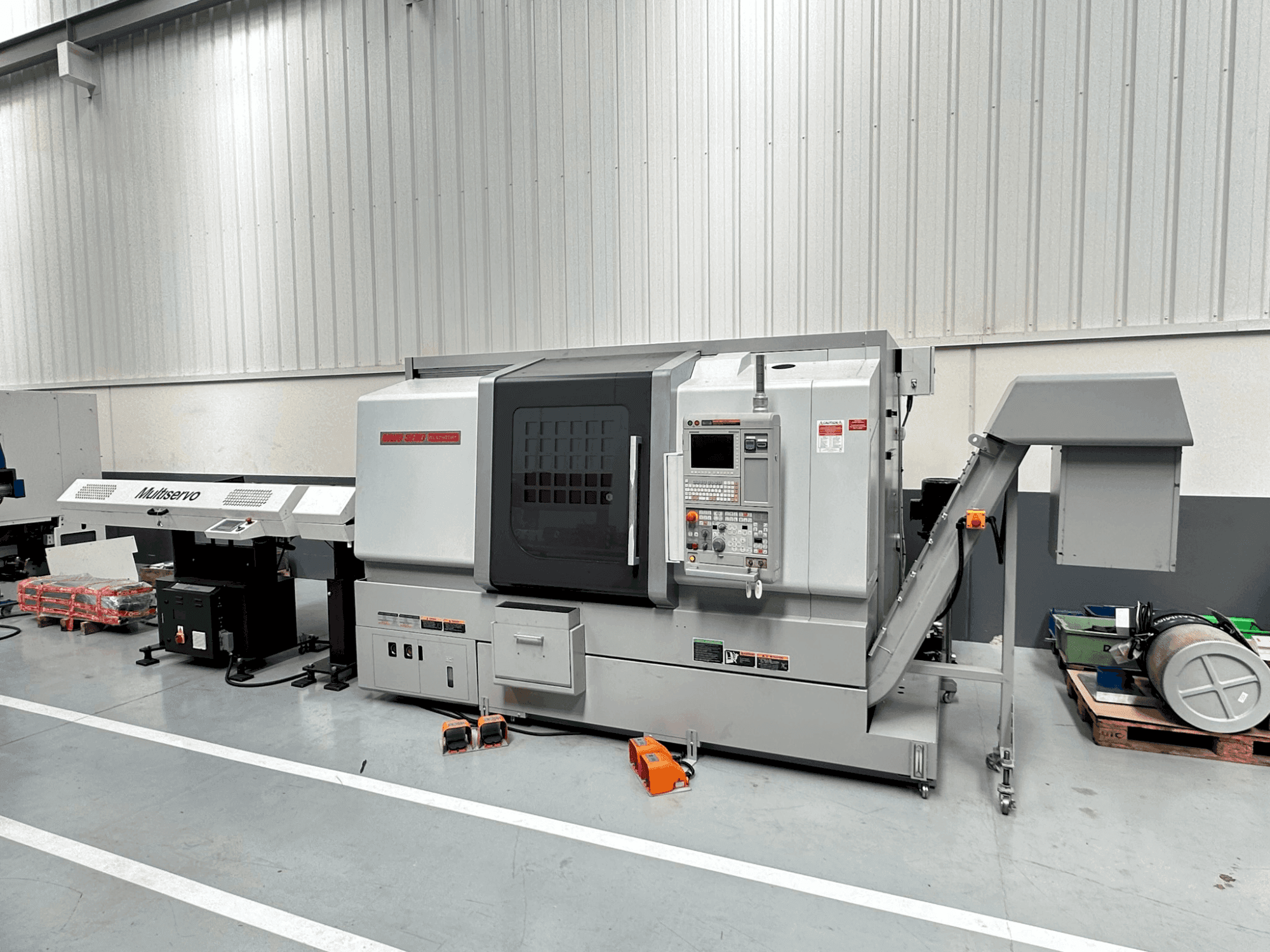 Вид станка MORI SEIKI NLX 2500 SY/700 спереди