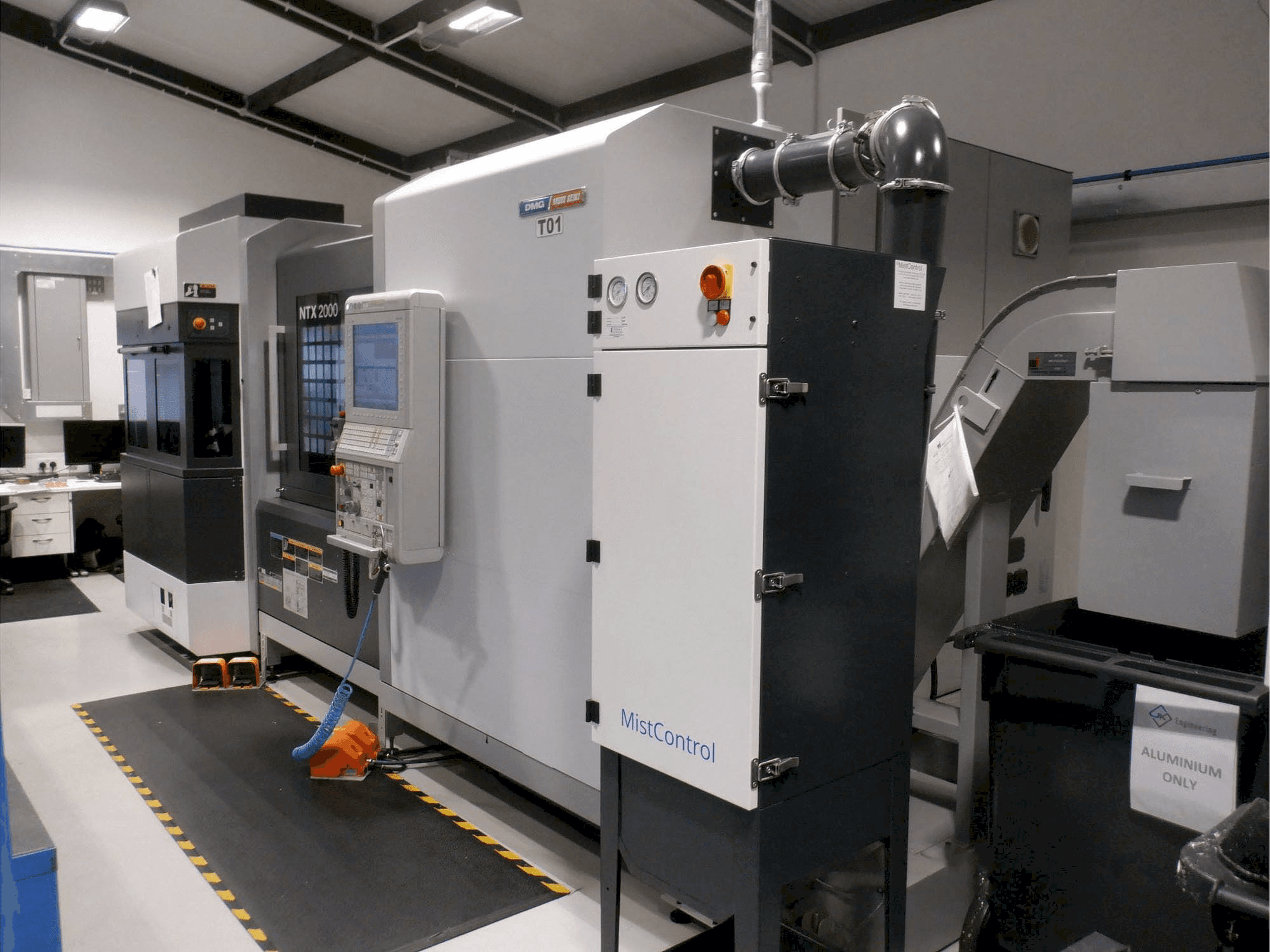 Вид станка DMG MORI NTX 2000 спереди