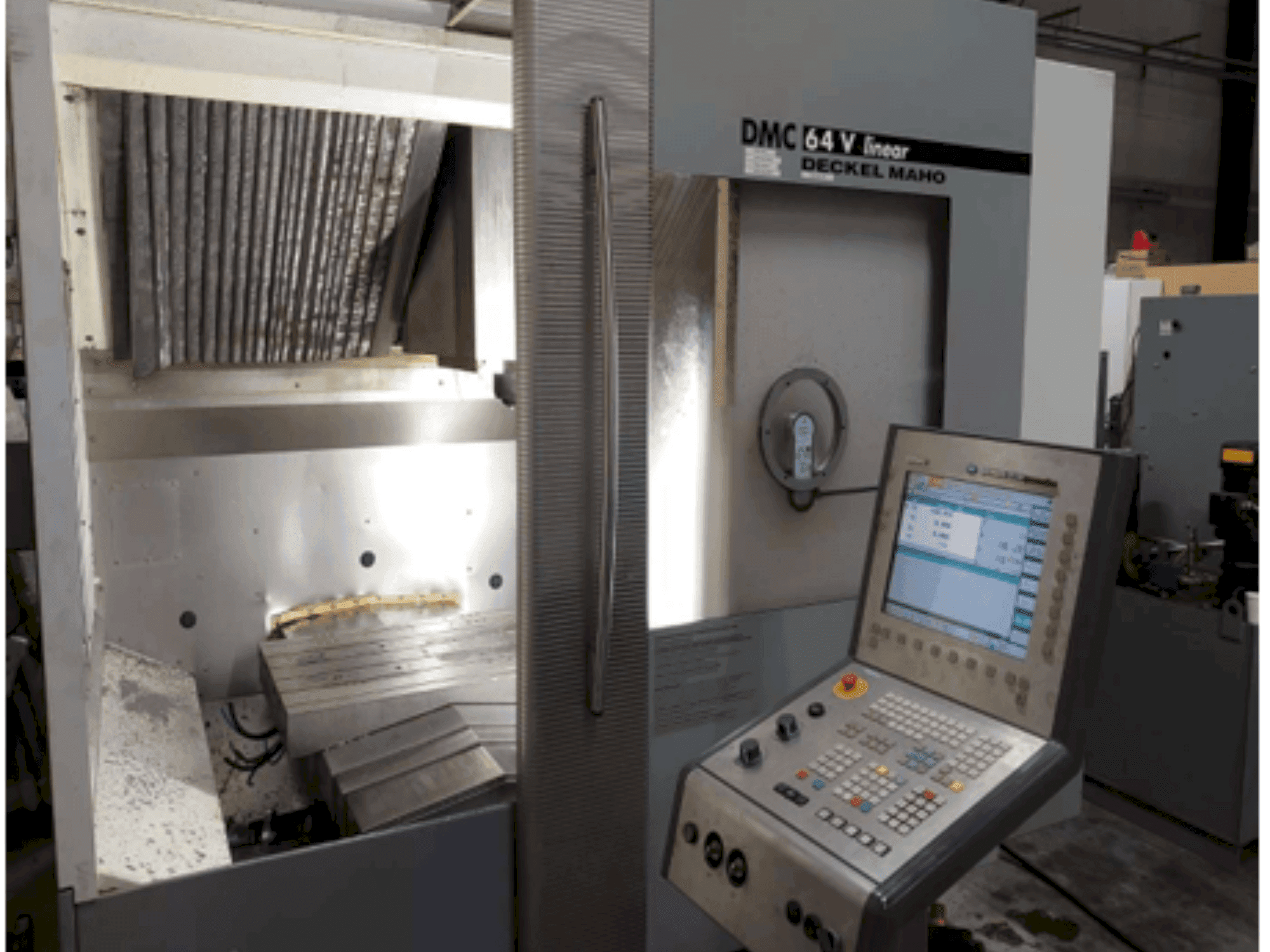 Вид станка DMG DECKEL MAHO DMC 64V linear спереди