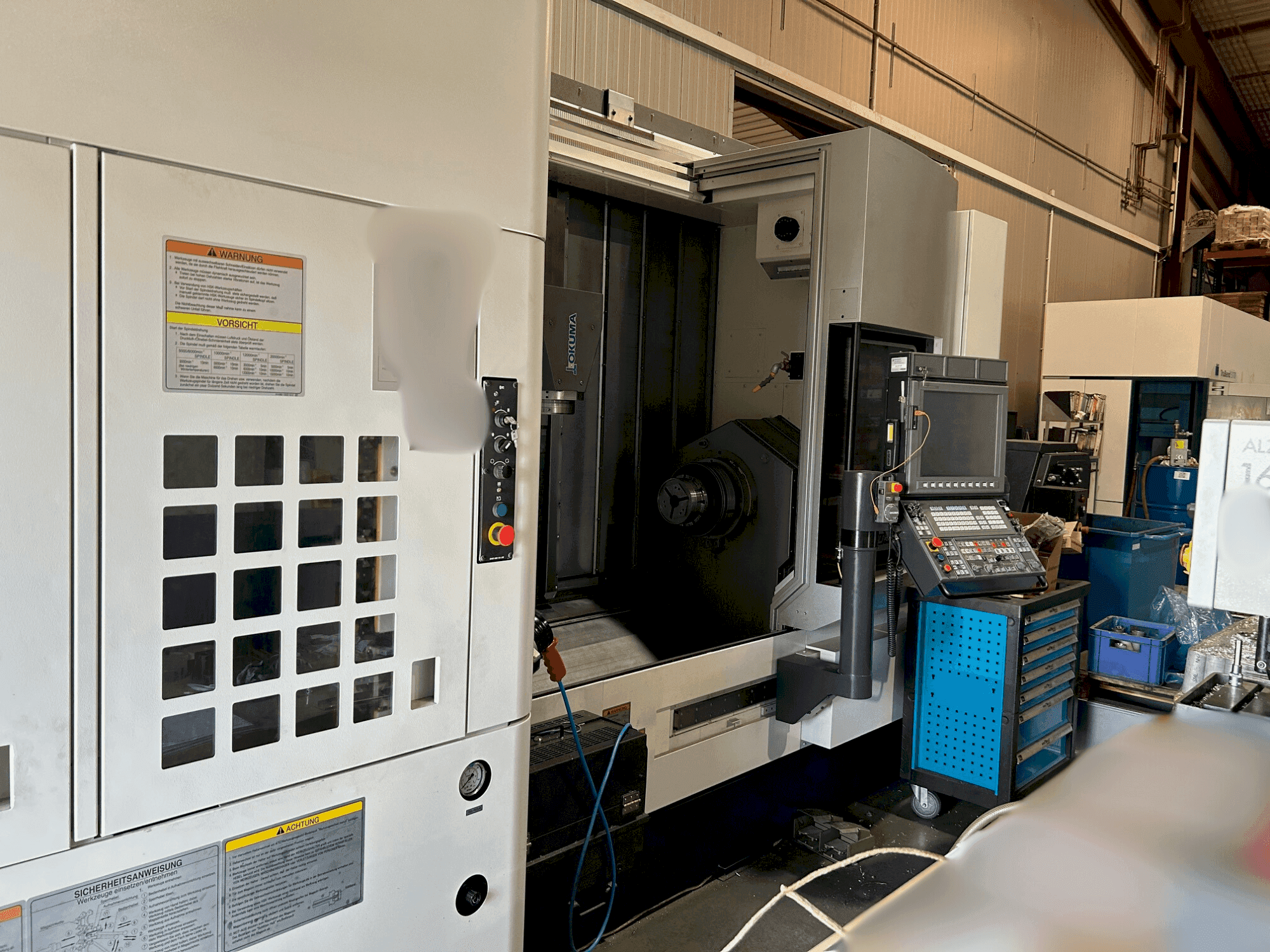 Вид станка Okuma Multus U3000 1SW 1500 спереди