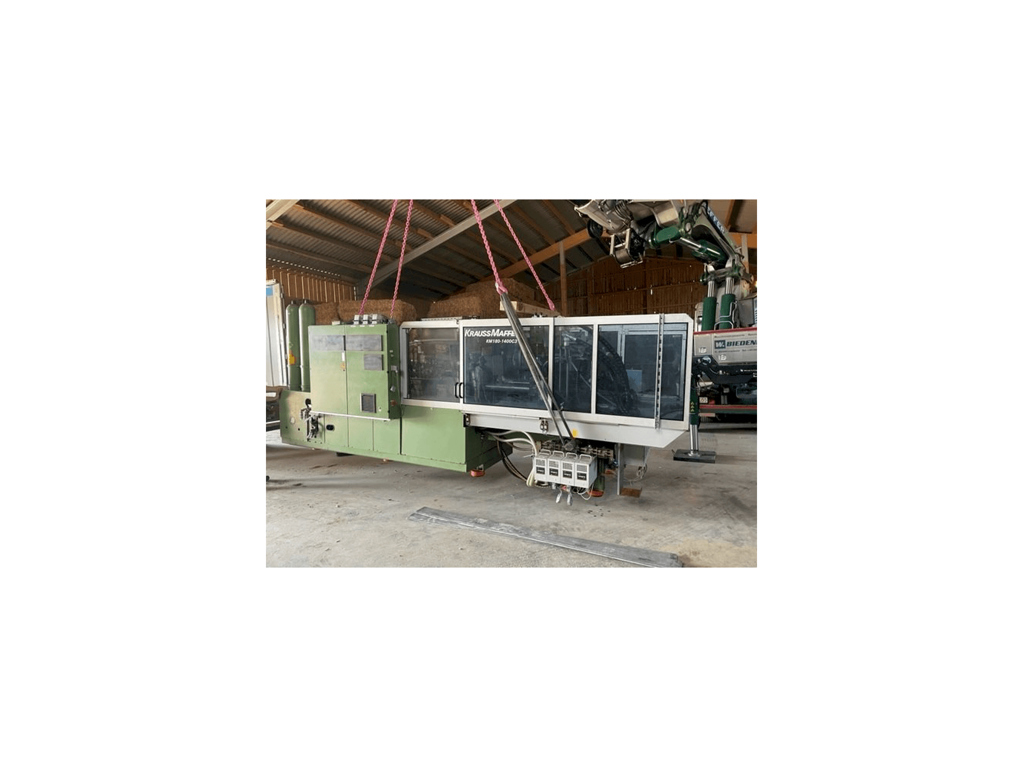 Вид станка Krauss Maffei KW180 C3 hybrid спереди