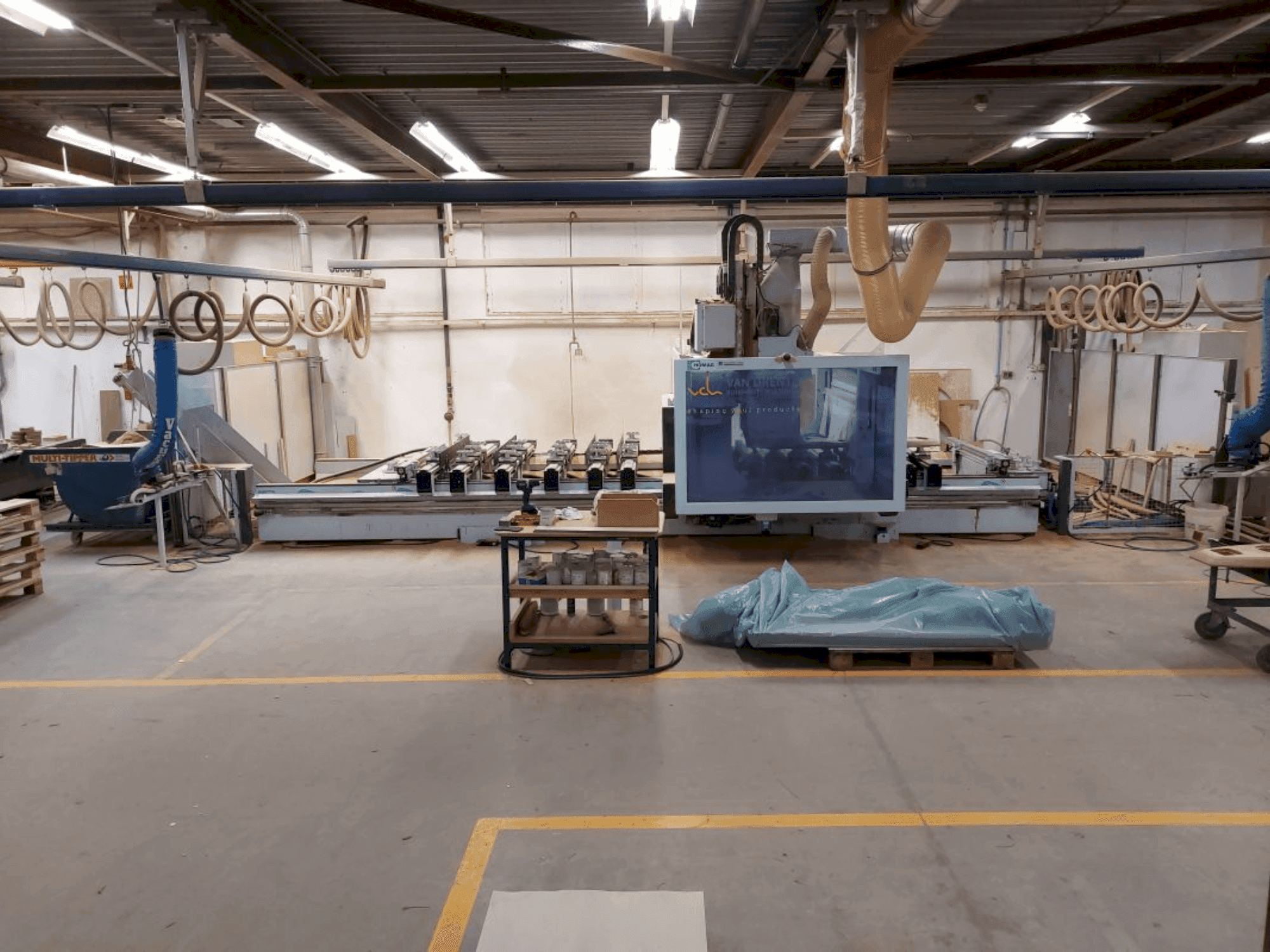 Вид станка HOMAG WEEKE Profi BMG 611/60/15/F/AP спереди