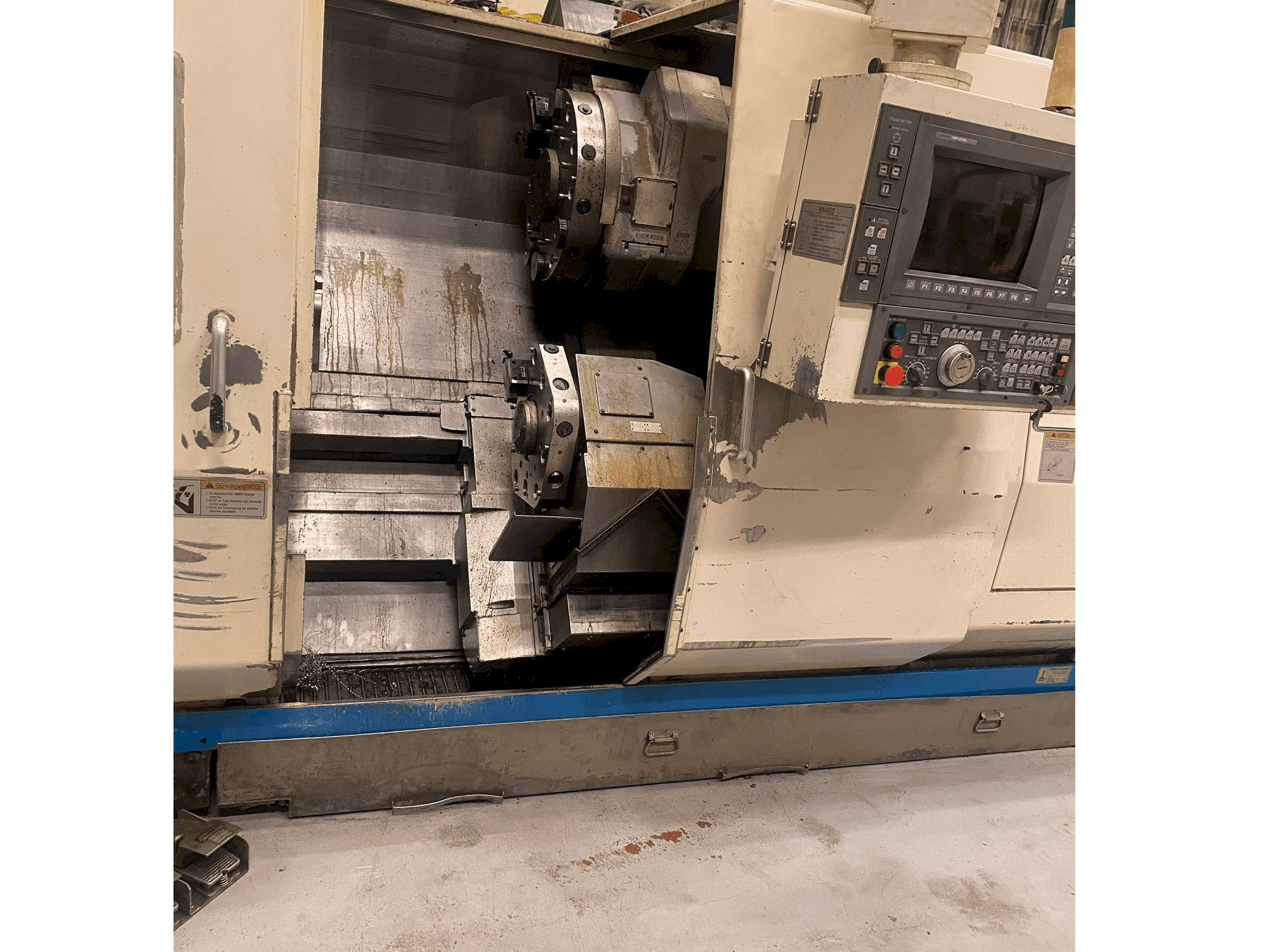 Вид станка Okuma LU 25 слева