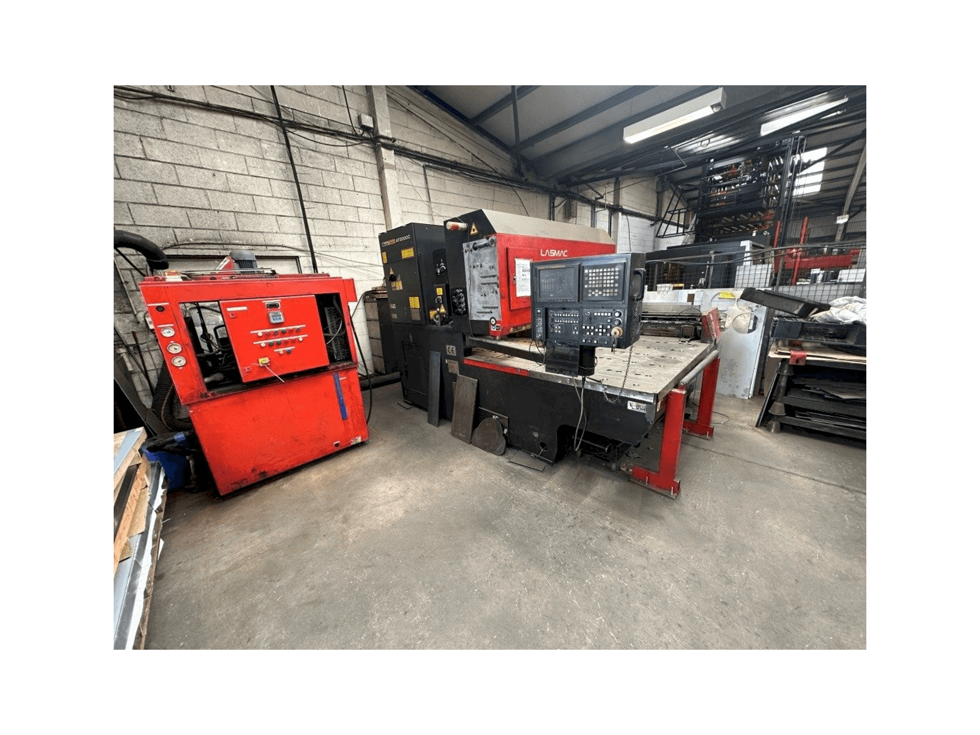 Вид станка AMADA Lasmac LC1212A3 спереди