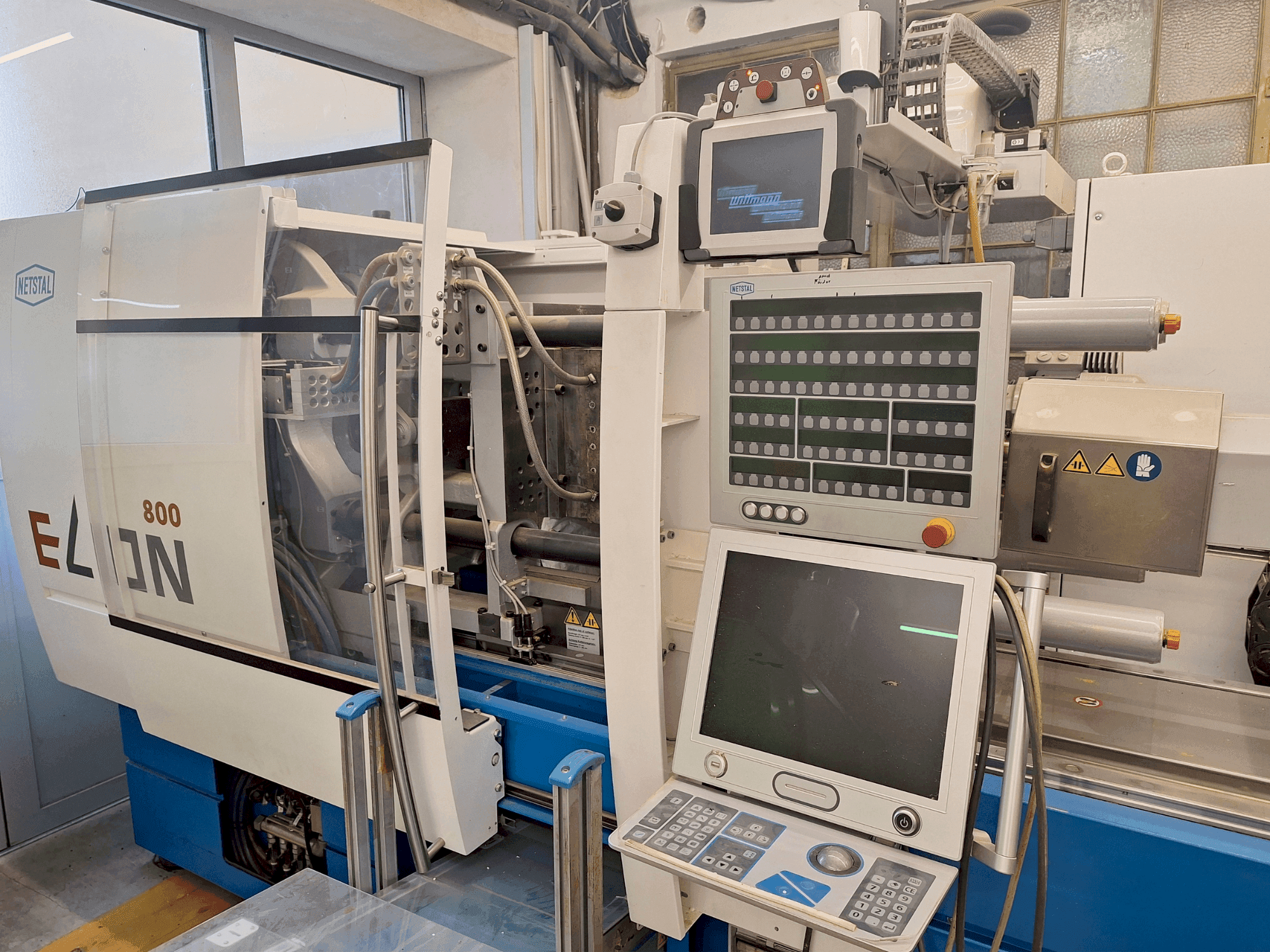 Вид станка Netstal Elion 800-270 спереди