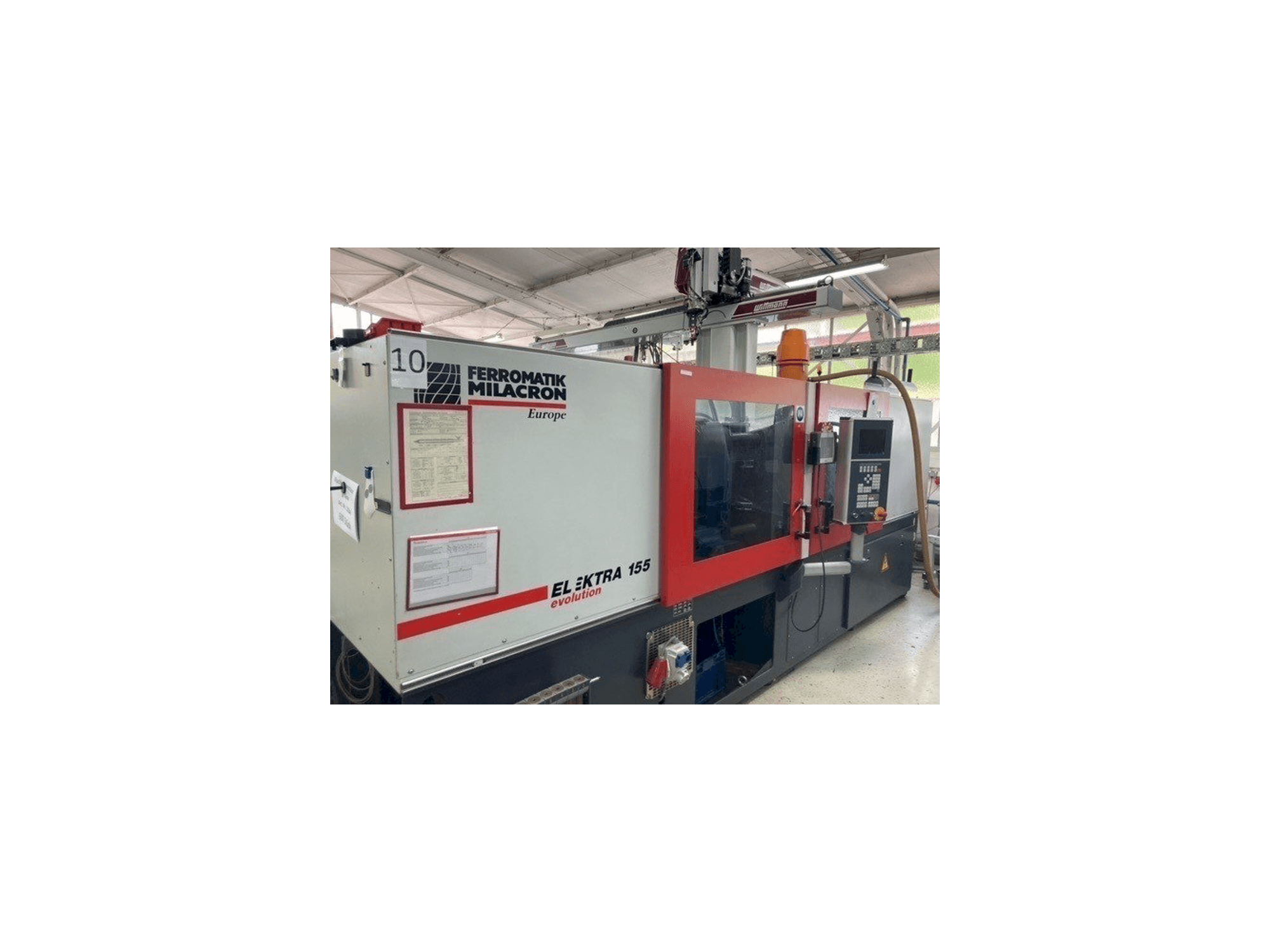 Вид станка FERROMATIK MILACRON EE 155 спереди