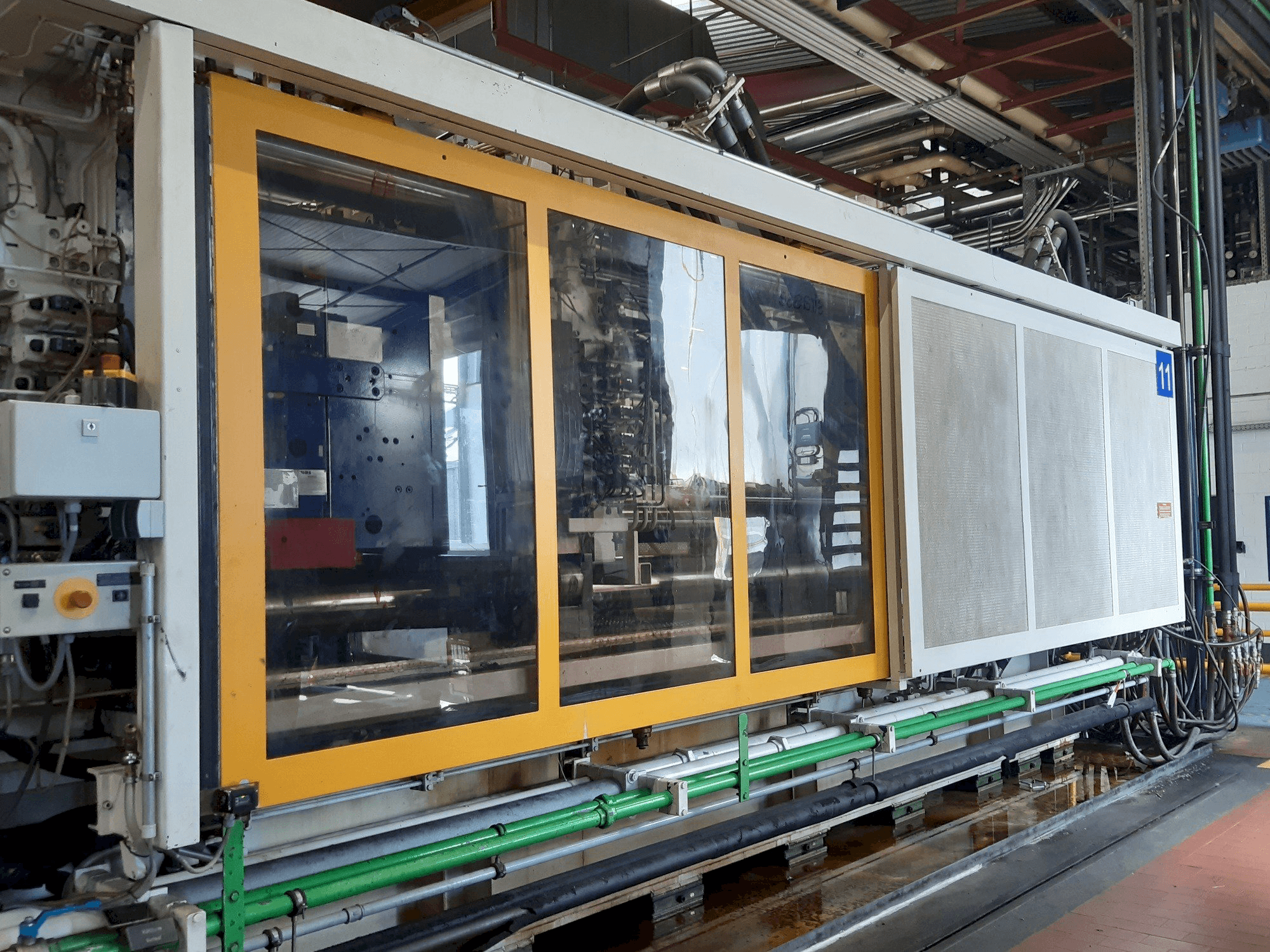 Front view of Krauss Maffei 1300-8000 M machine