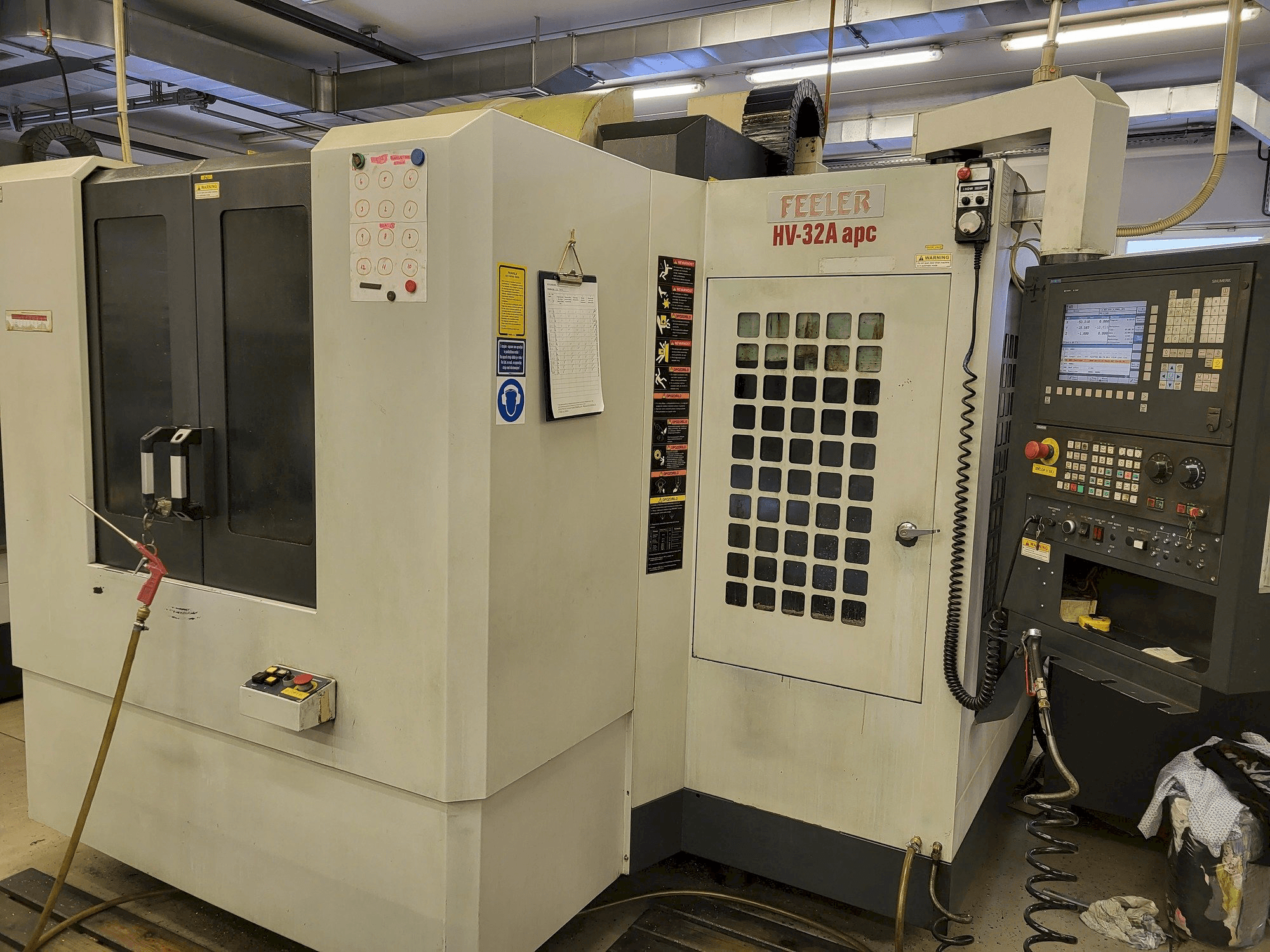 Вид станка Feeler HV-32A-APC спереди
