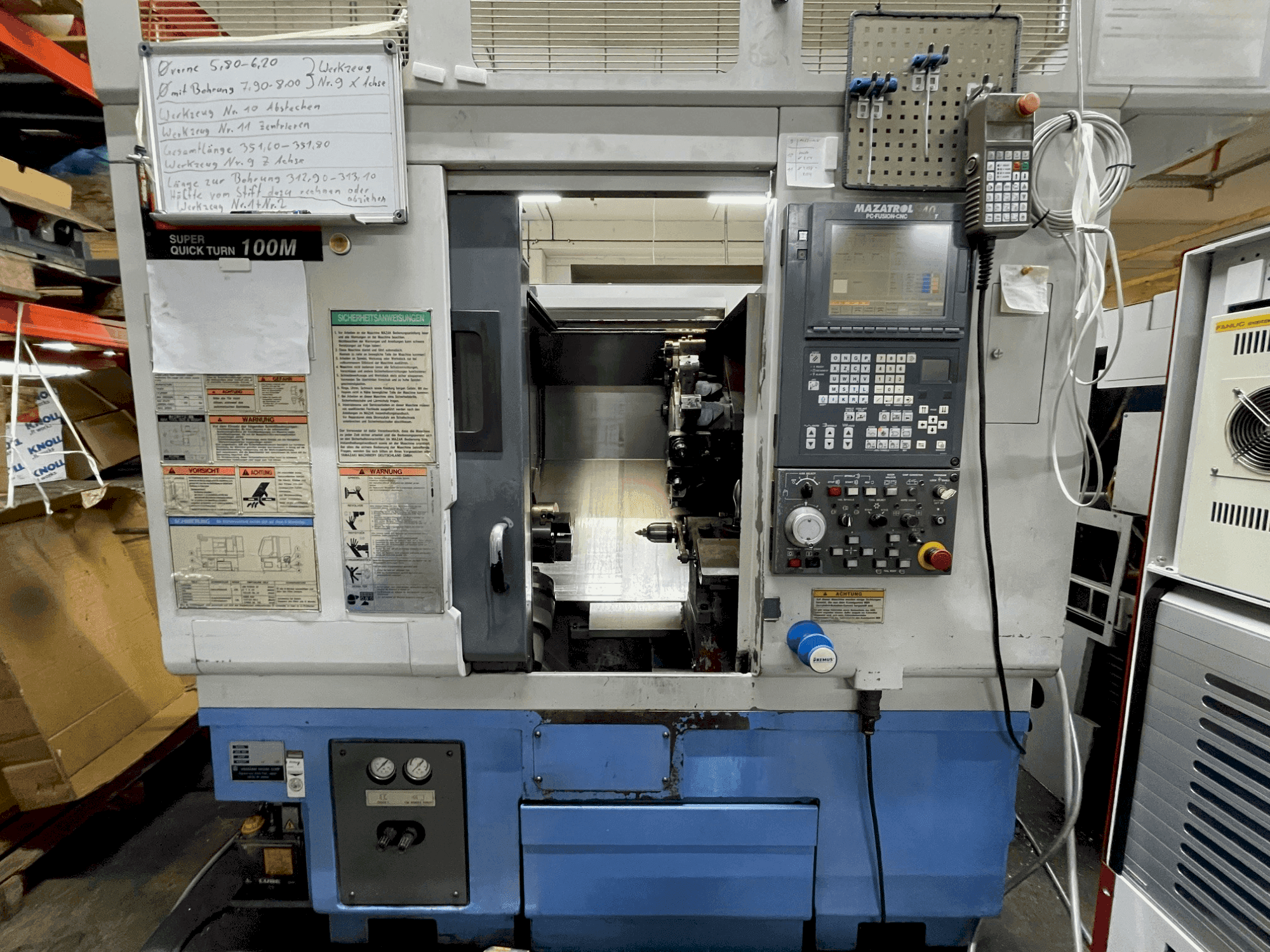 Вид станка Mazak SQT 100M спереди