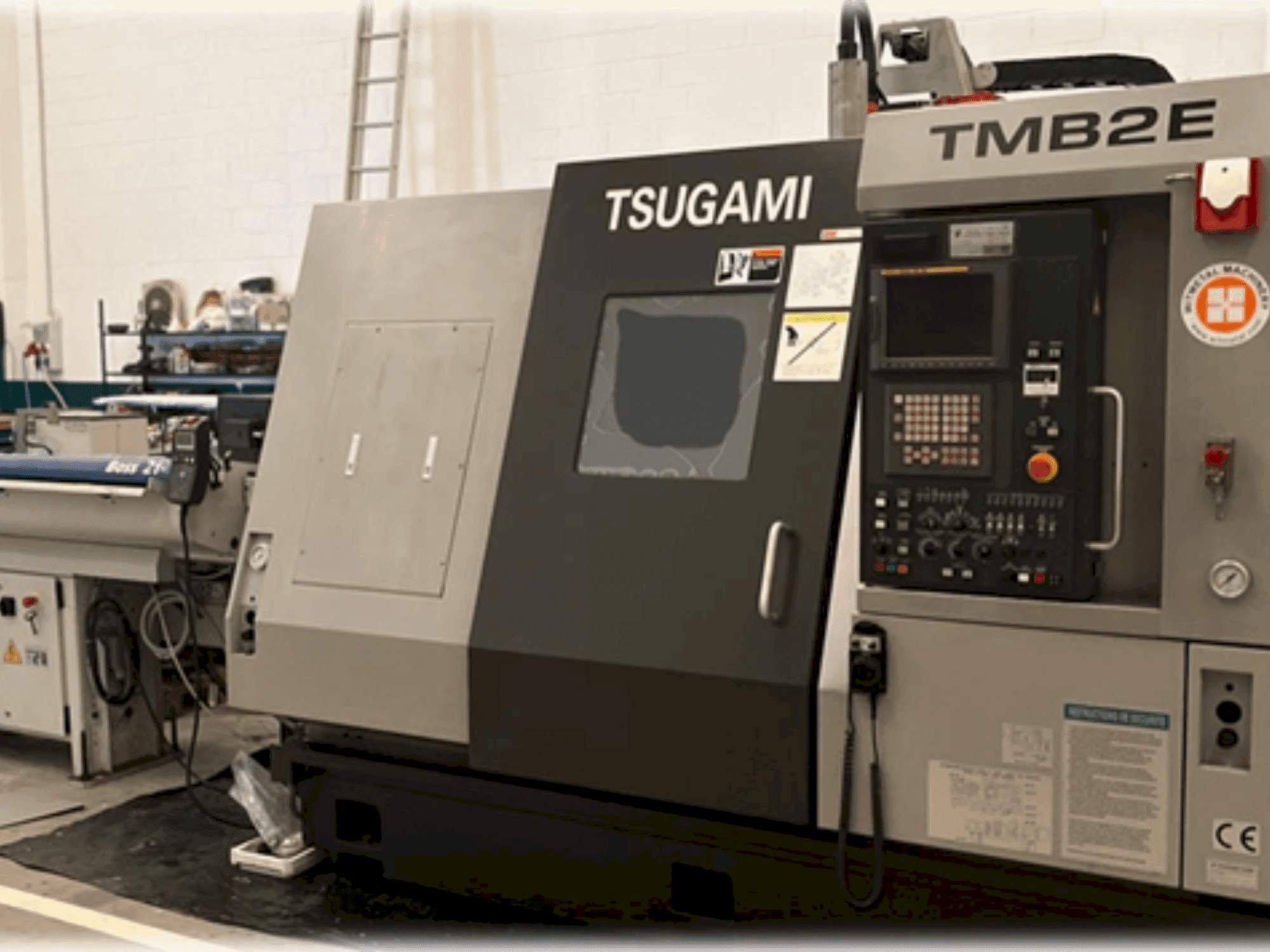 Вид станка TSUGAMI TMB 2E спереди