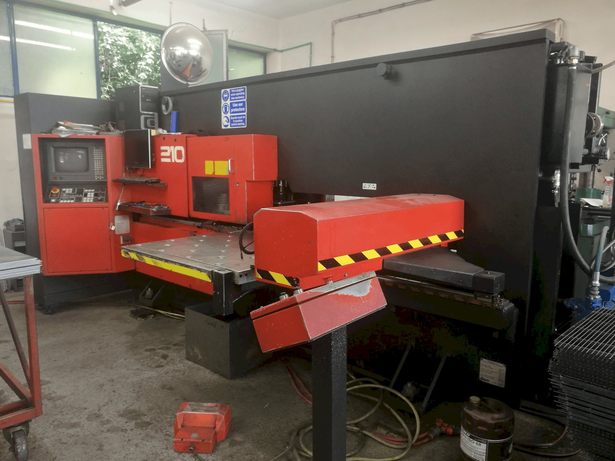 Front view of AMADA Arcade 210 machine