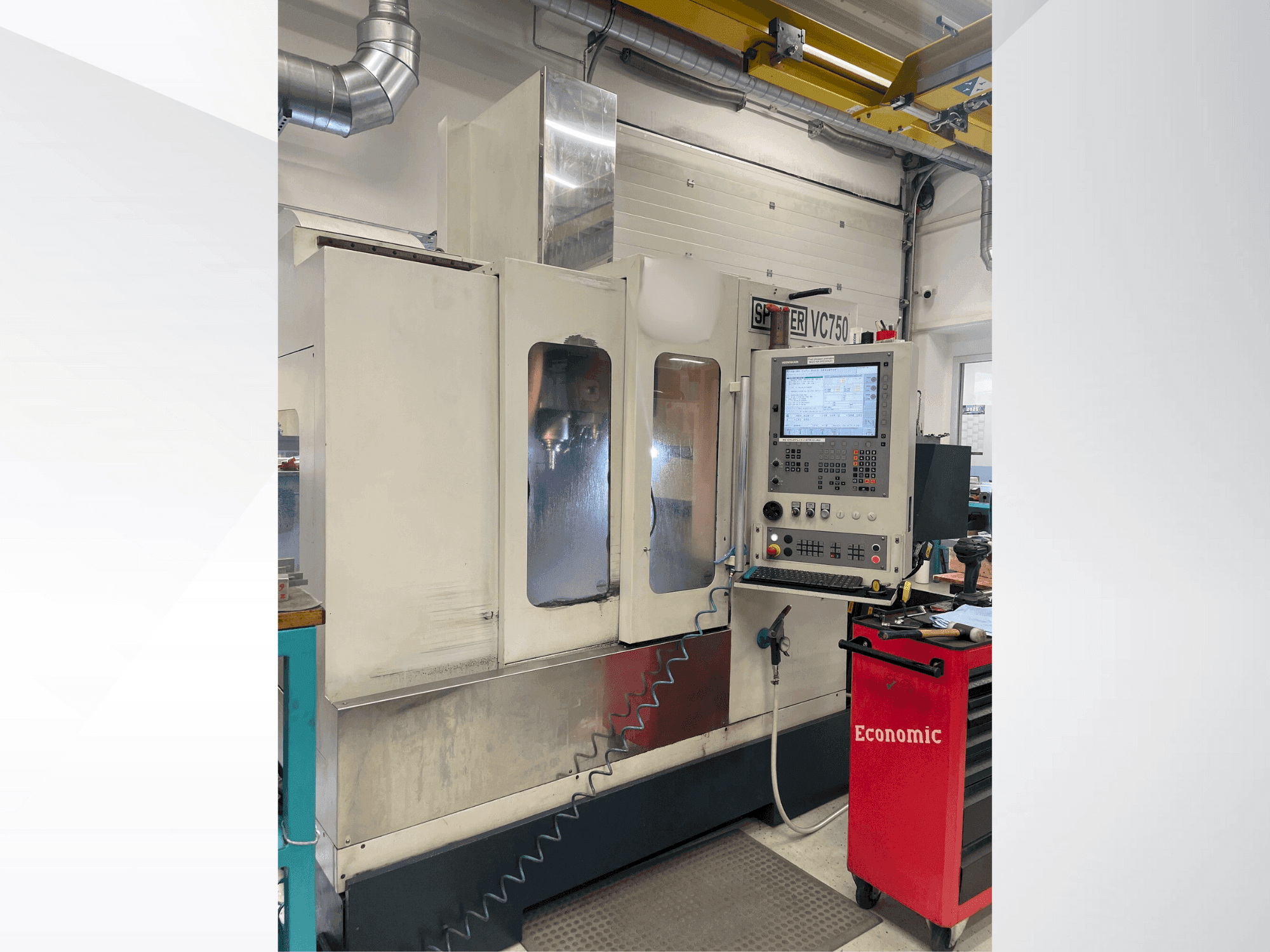 Вид станка SPINNER VC 750 спереди