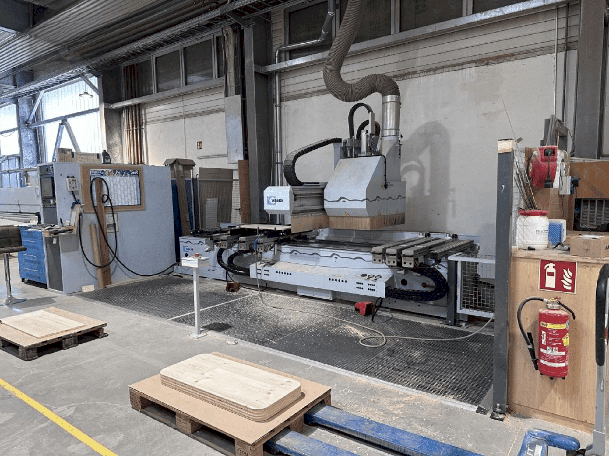 Вид станка Weeke OPTIMAT BHC 550 спереди