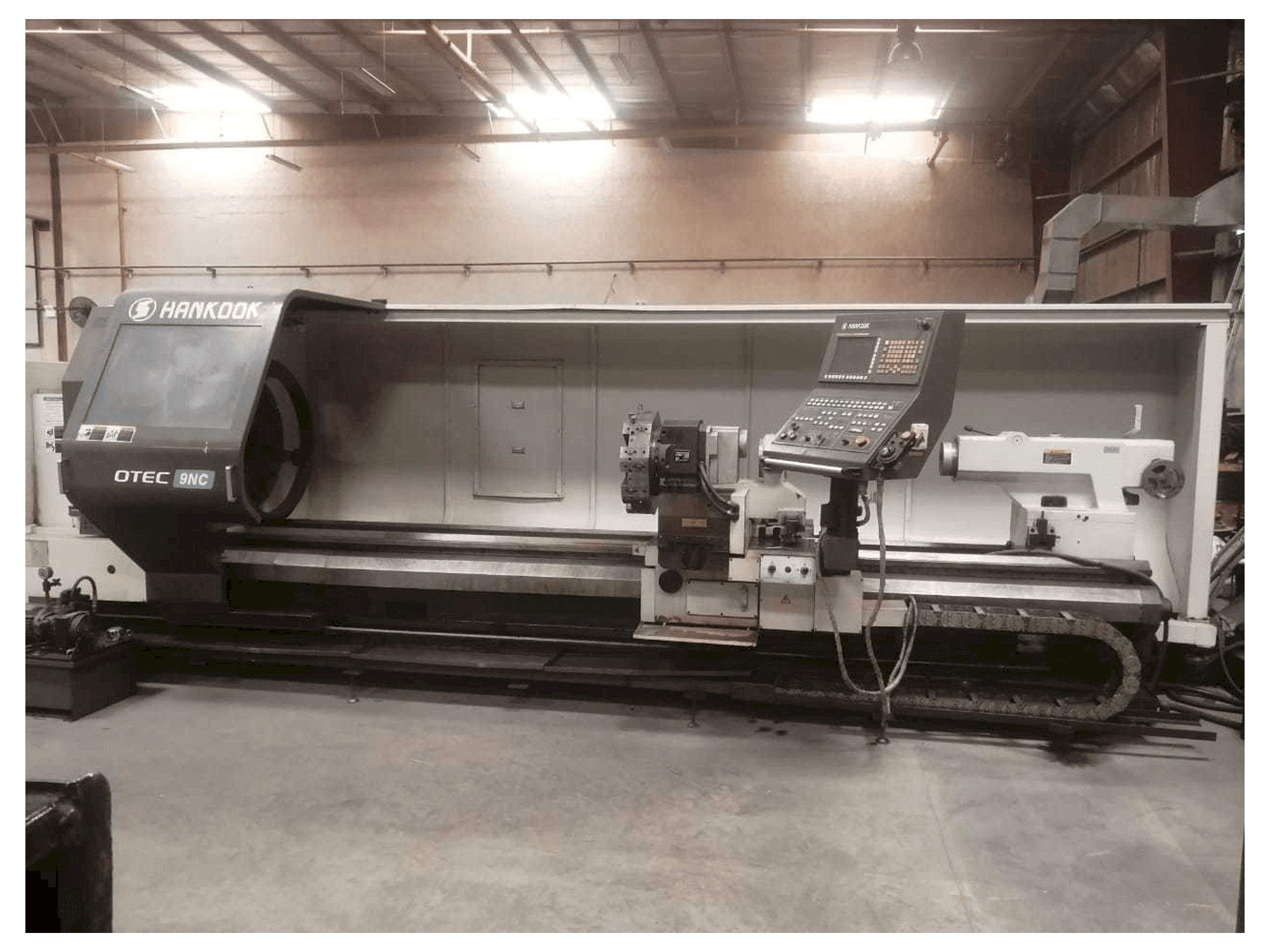Вид станка HANKOOK PROTEC-9NC спереди