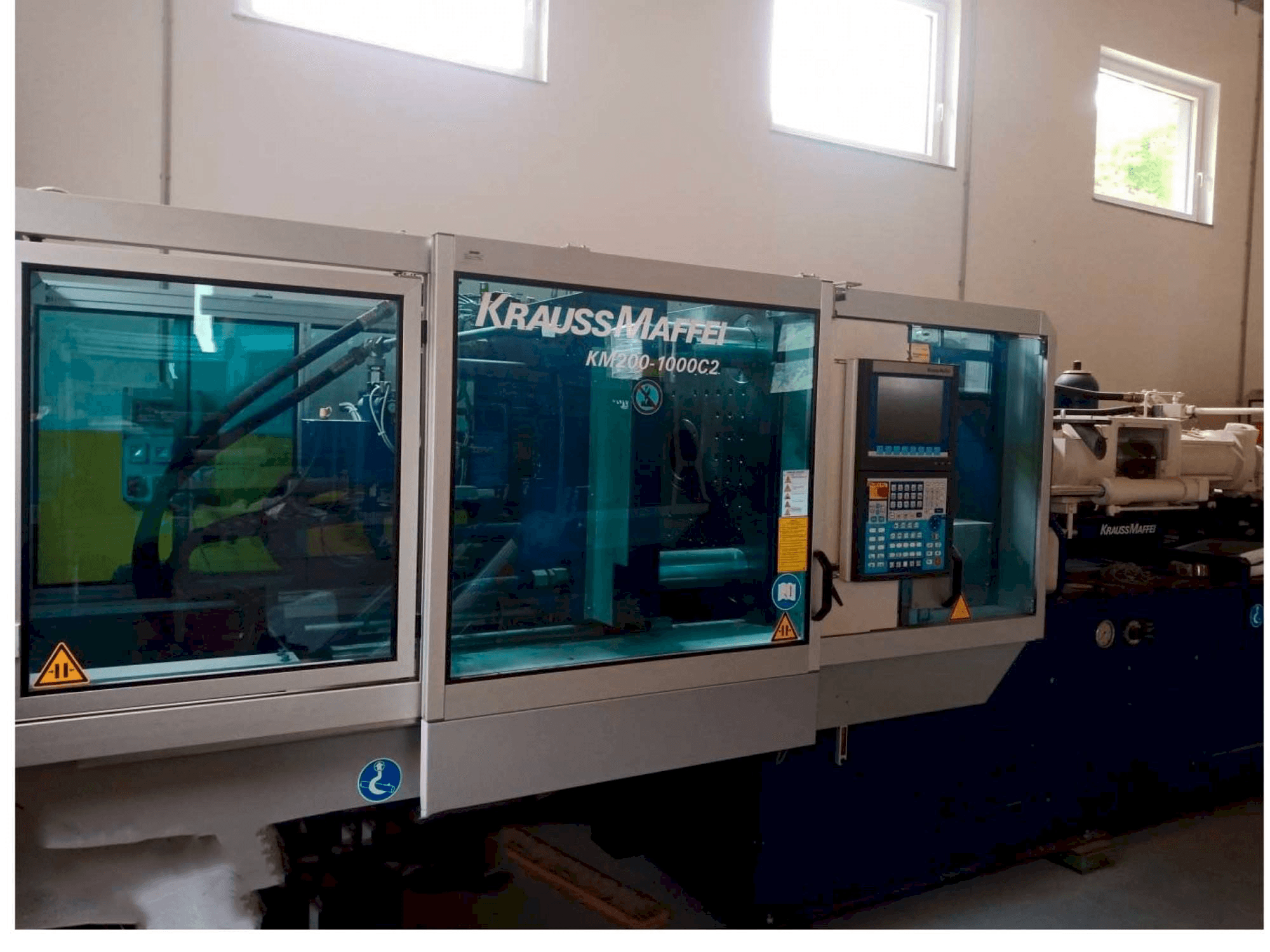Вид станка Krauss Maffei KM 200/1000 спереди