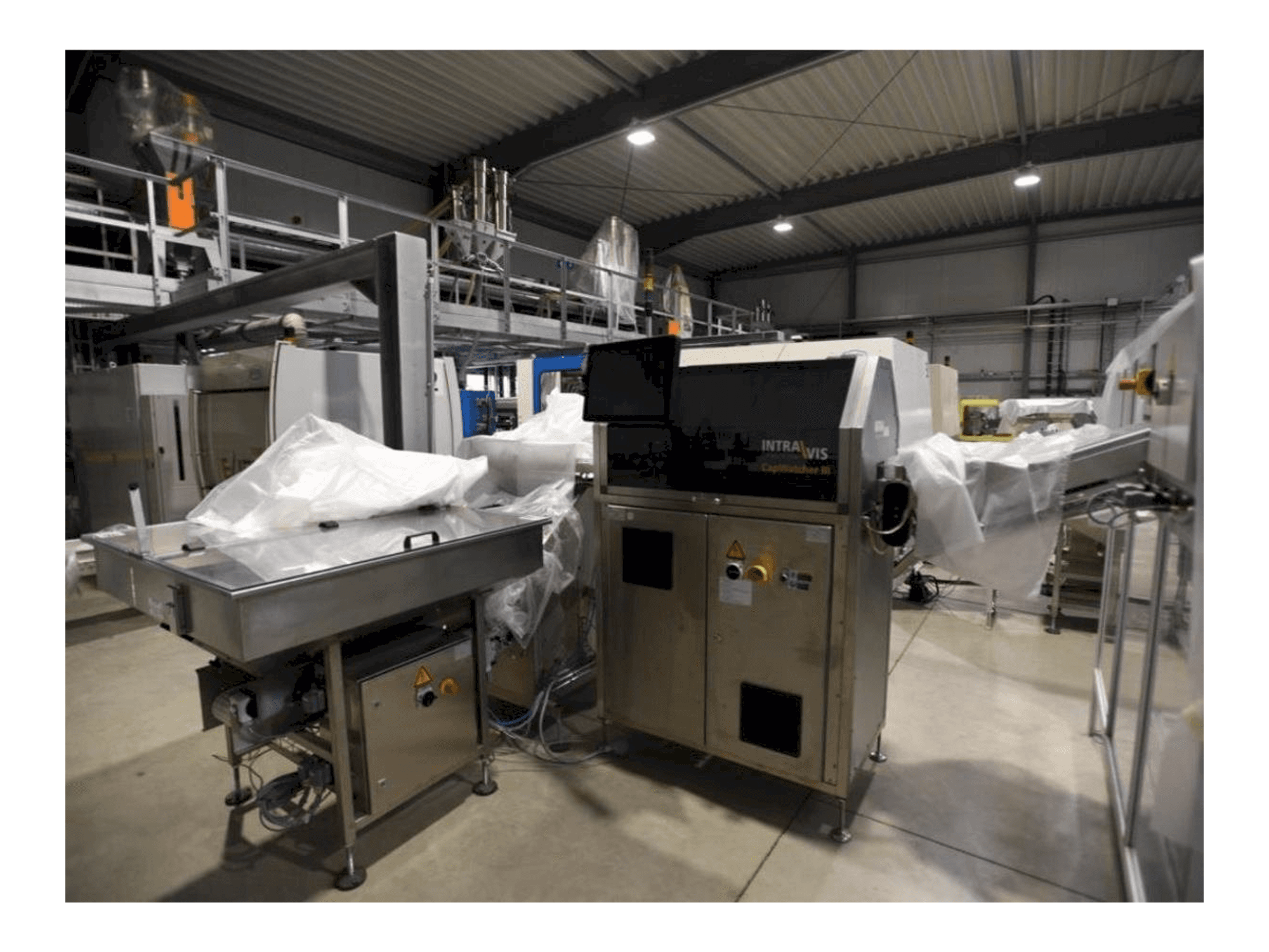 Вид станка INTRAVIS Capwatcher 6275 спереди