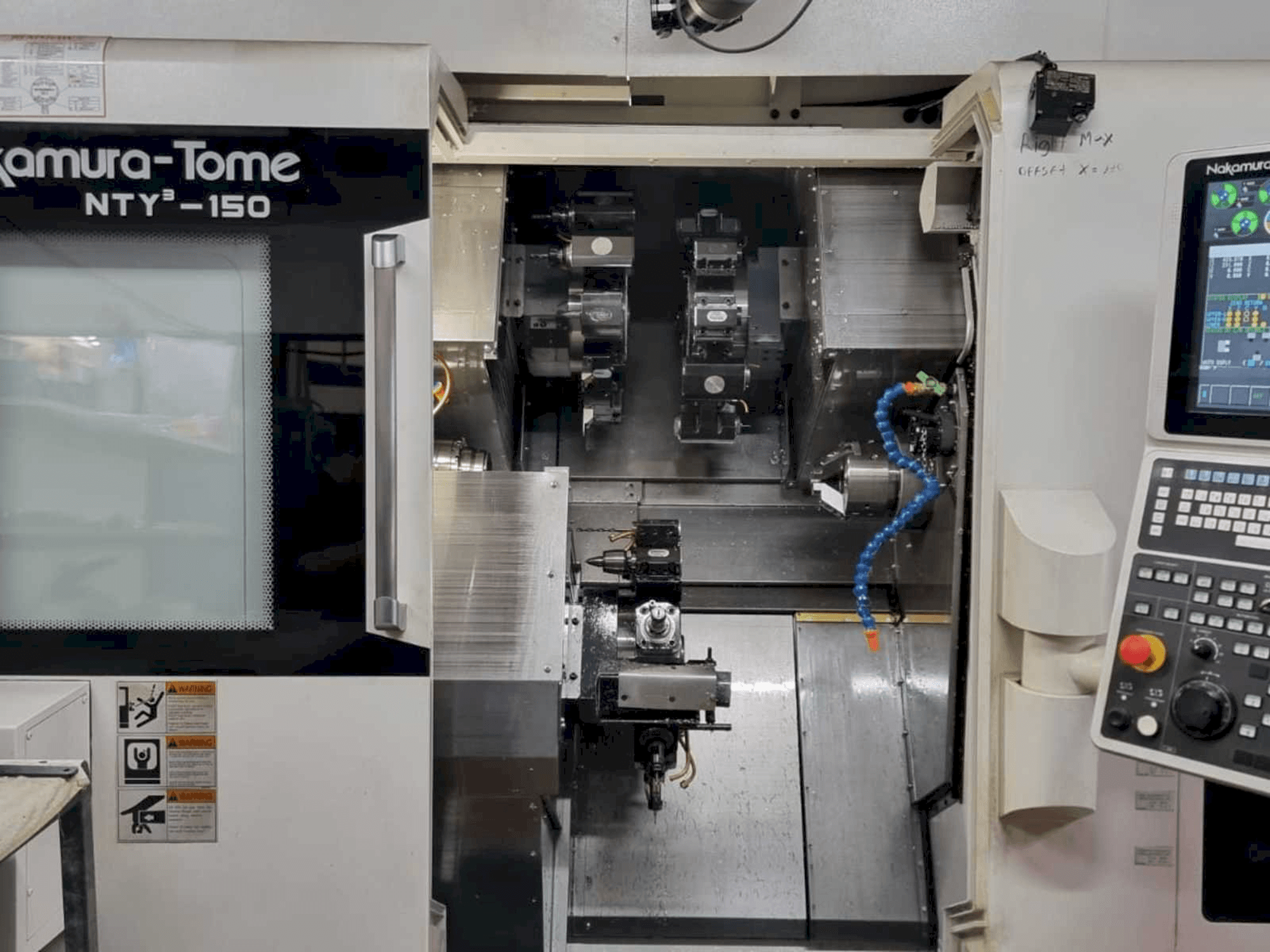 Вид станка NAKAMURA-TOME NTY3-150 спереди