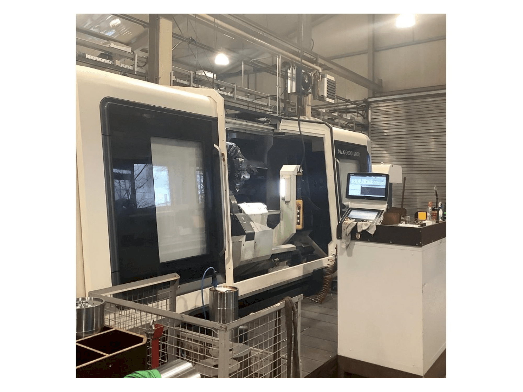 Вид станка DMG MORI NLX 6000 | 2000 спереди