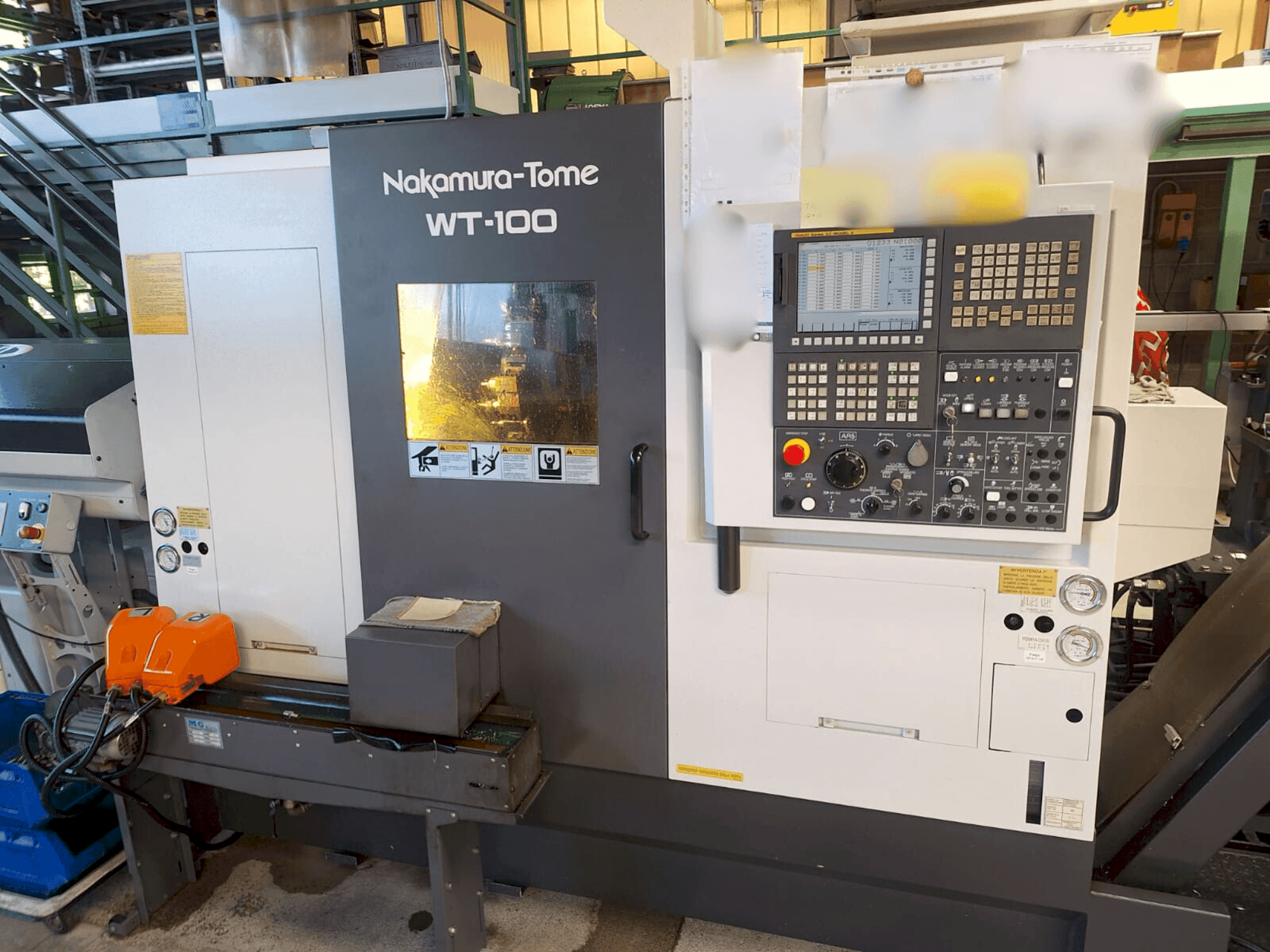 Вид станка NAKAMURA-TOME WT-100 спереди