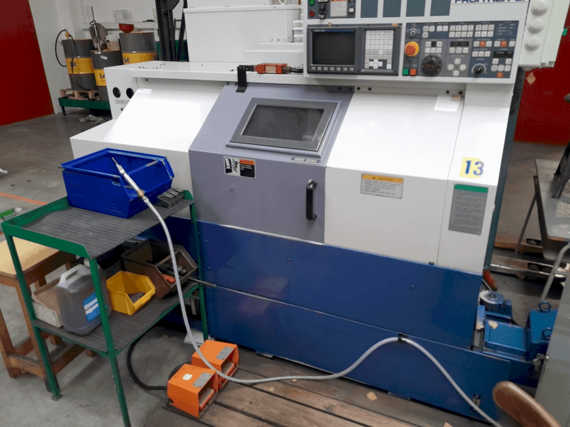 Вид станка MORI SEIKI Frontier L1 (1998) спереди