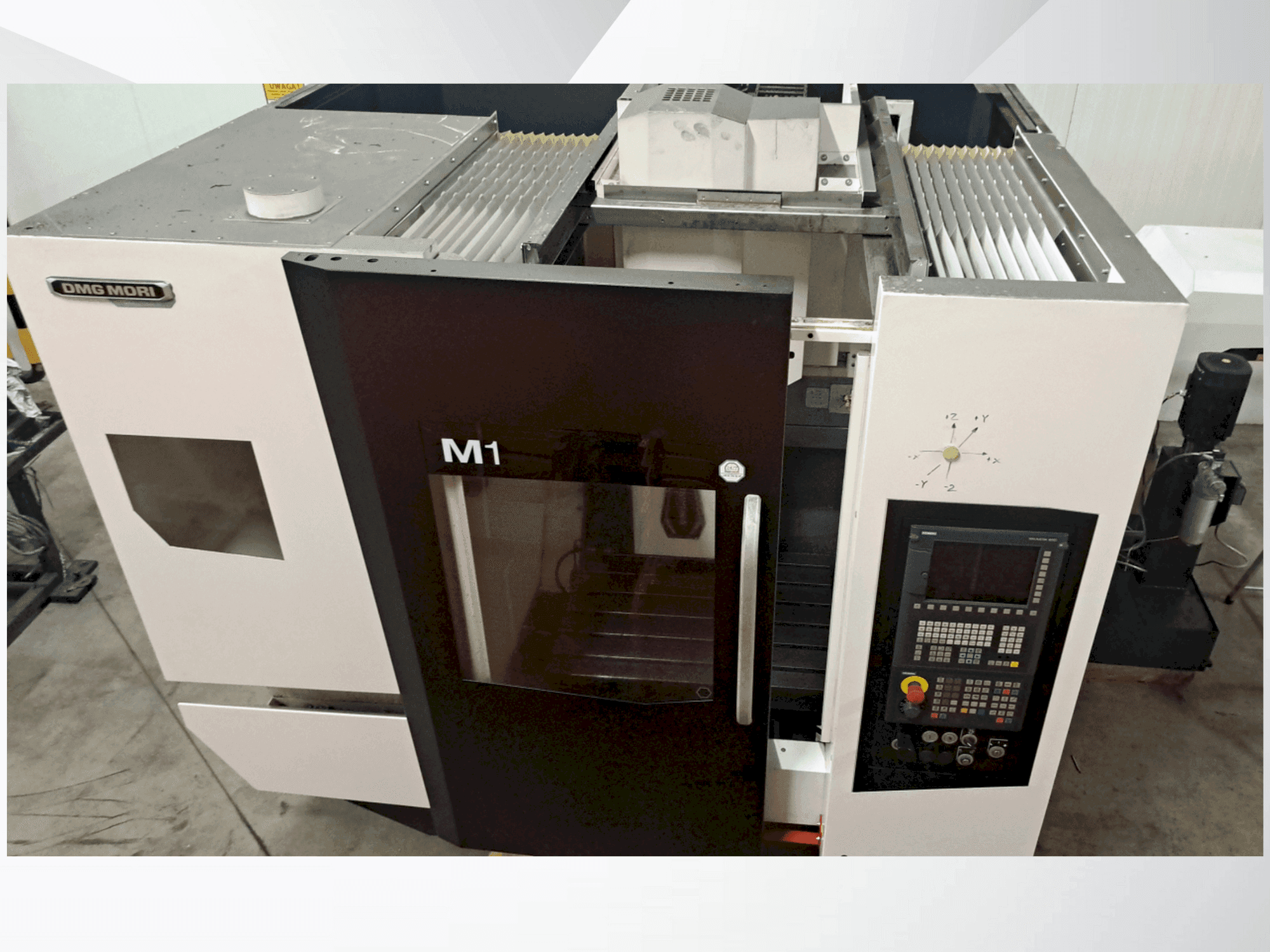 Вид станка DMG MORI M1 PRO спереди