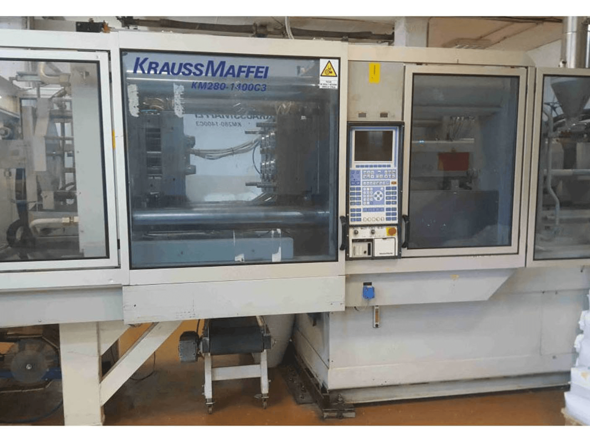 Вид станка Krauss Maffei KM 280-1400 C3 спереди