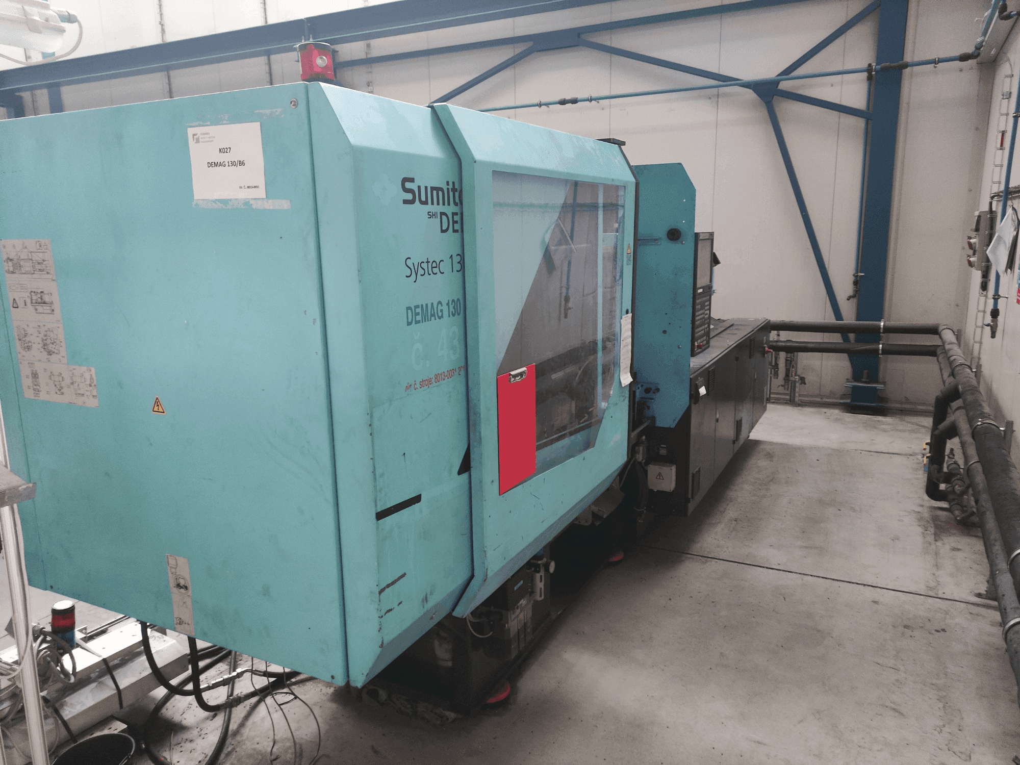 Вид станка DEMAG Systec 130/475-430 спереди