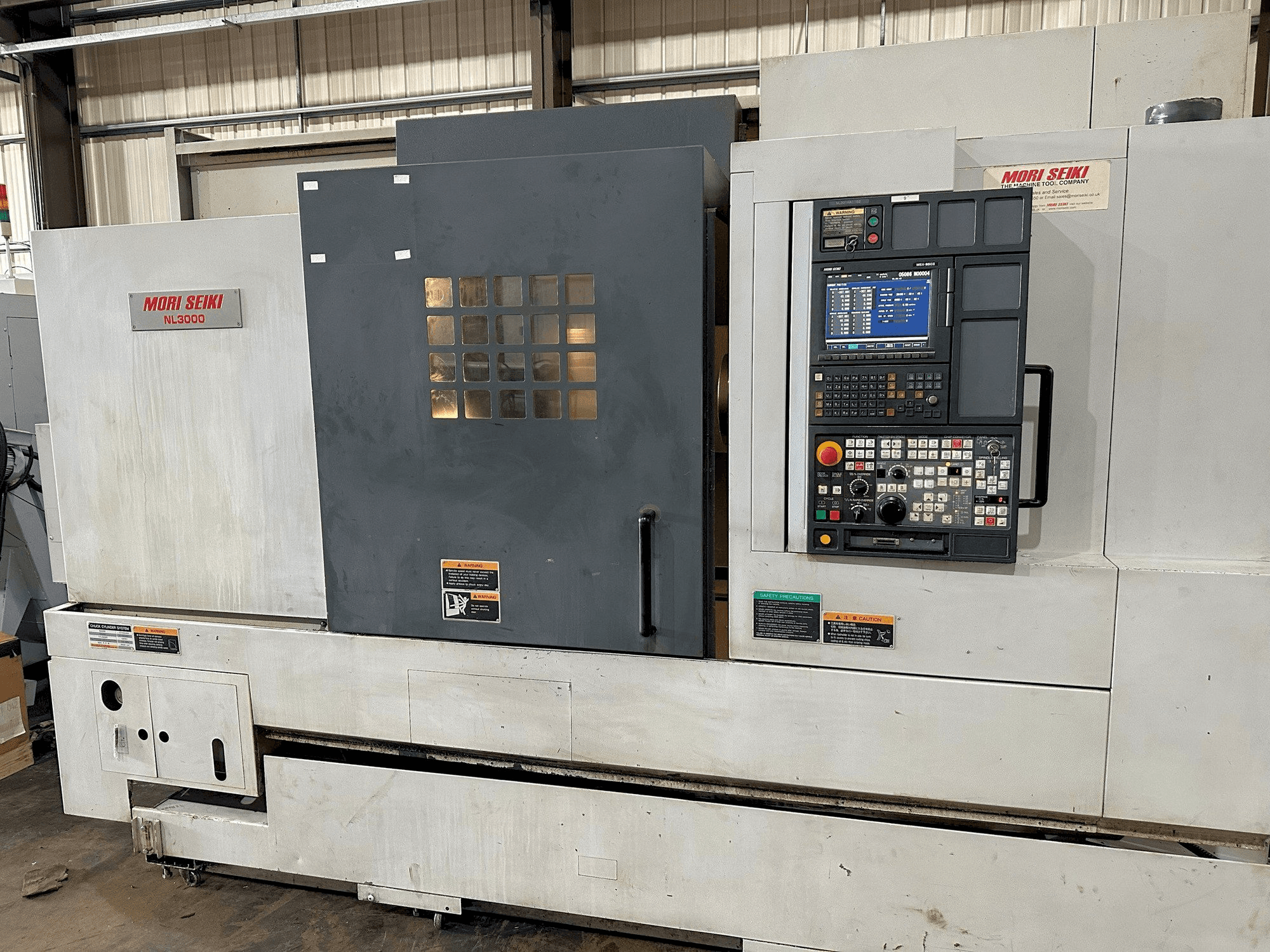Вид станка MORI SEIKI NL3000Y/700 спереди