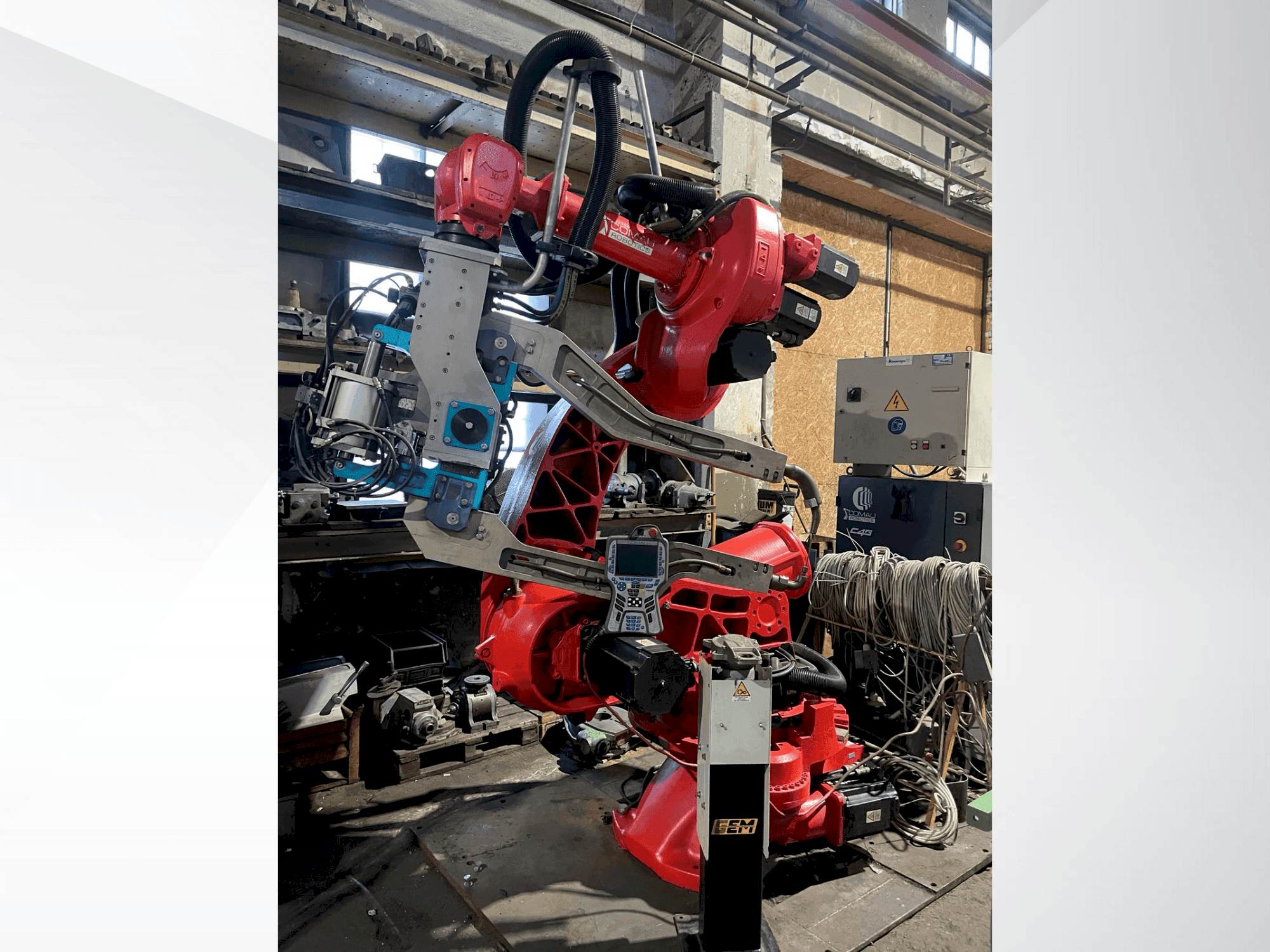 Вид станка COMAU C4G спереди