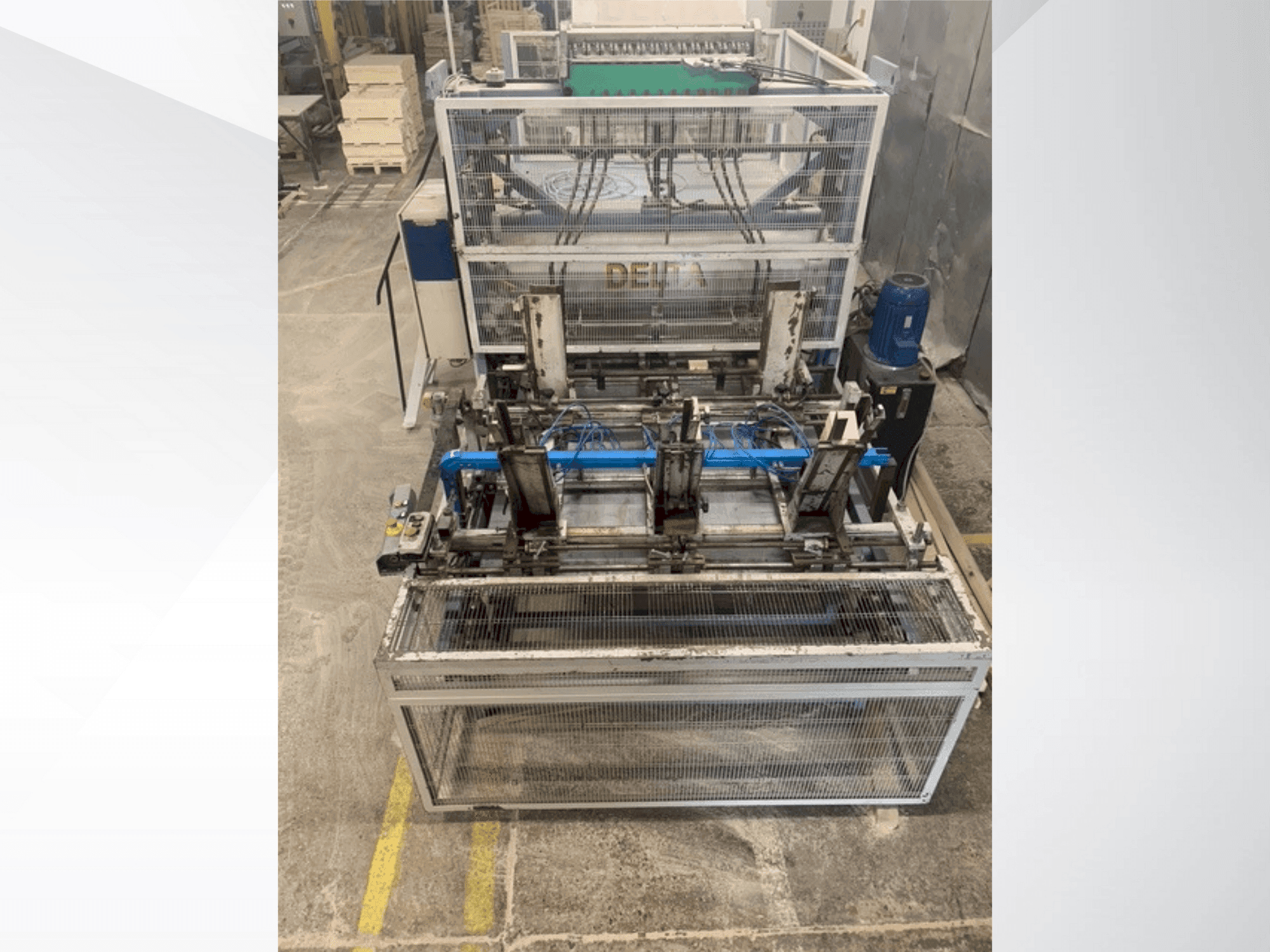 Вид станка DELTA pallet nailing machine line спереди
