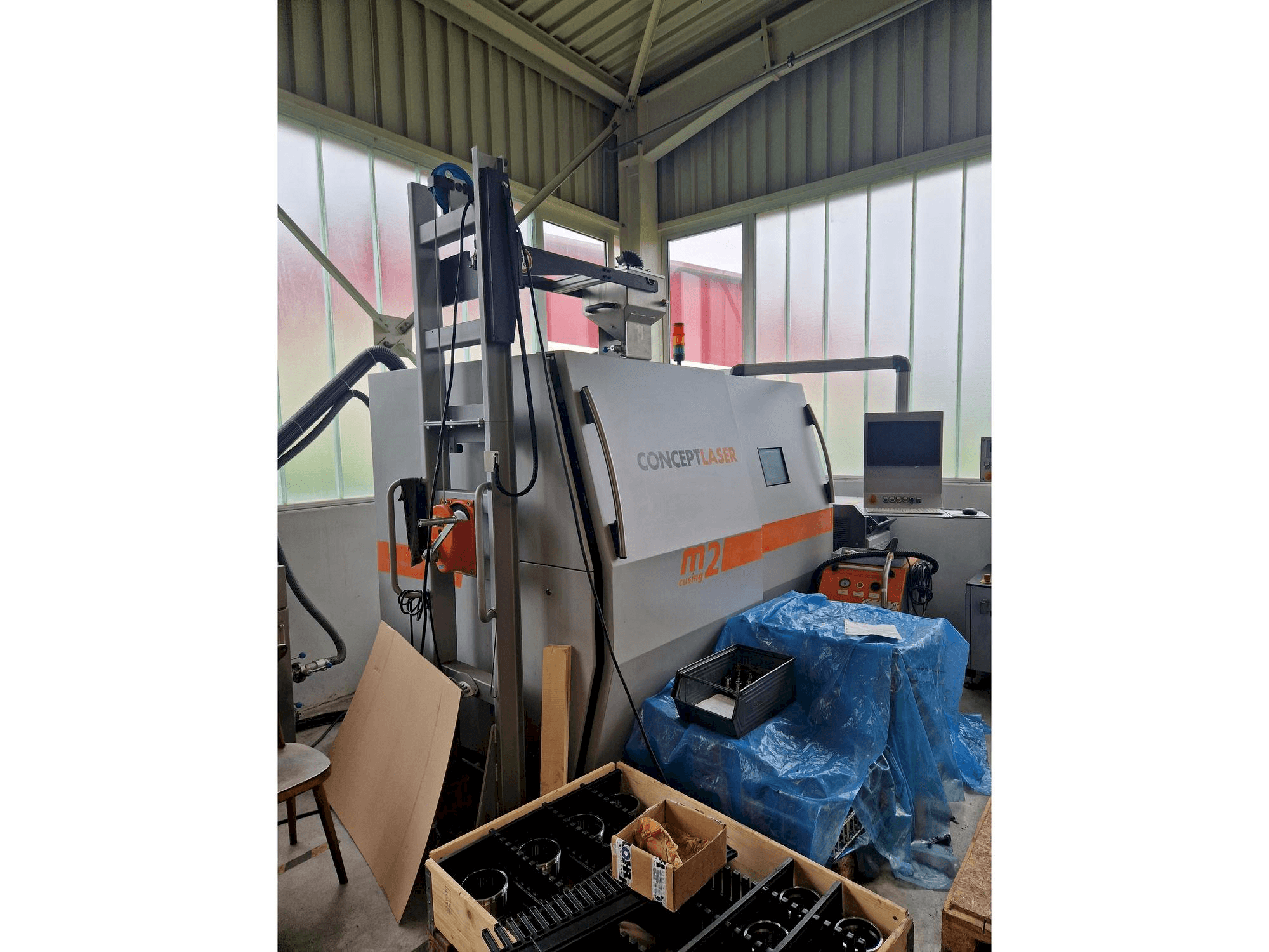 Вид станка CONCEPT LASER M2 cusing спереди