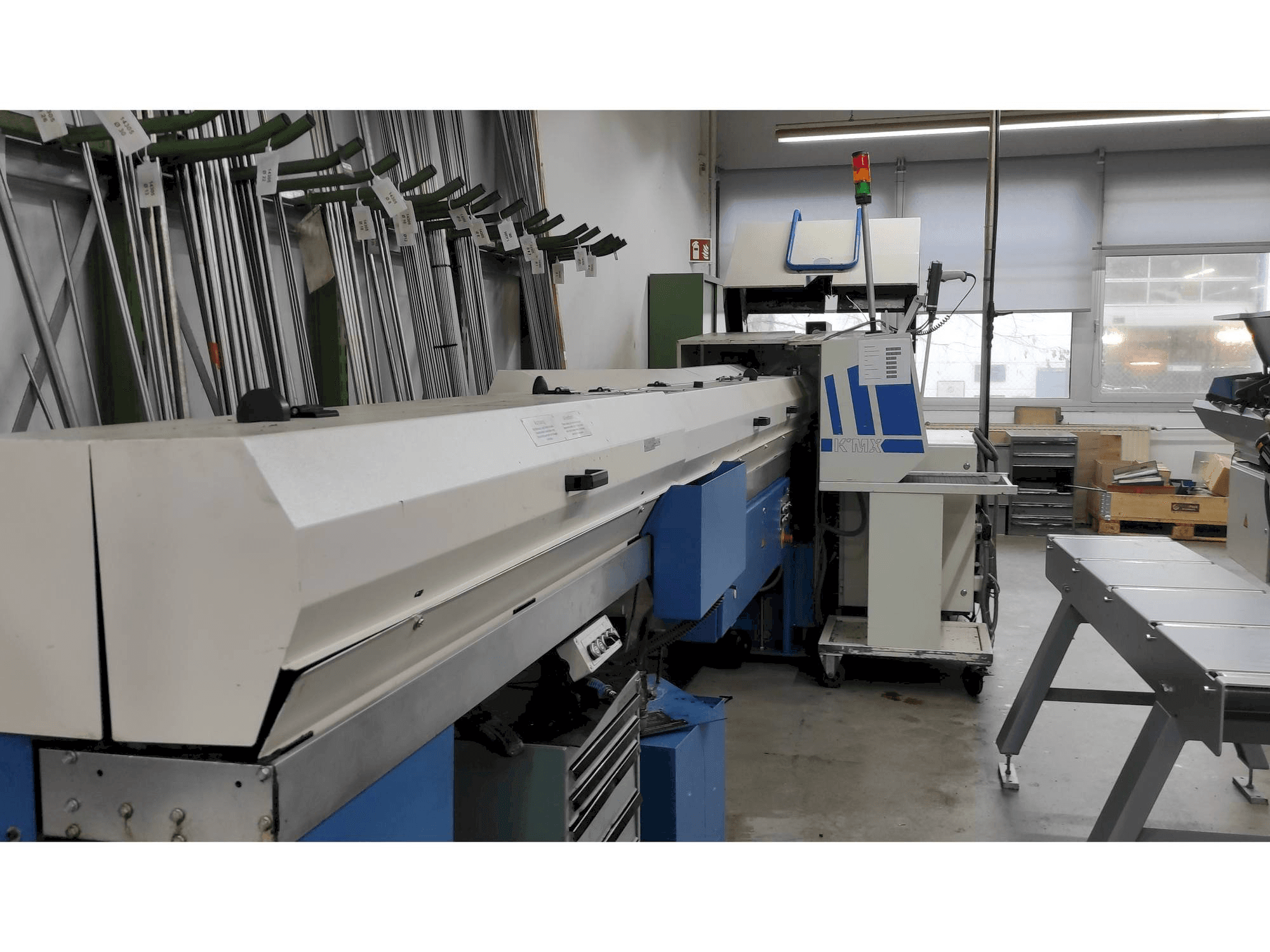 Вид станка Manurhin KMX 226 with FMB bar loader слева