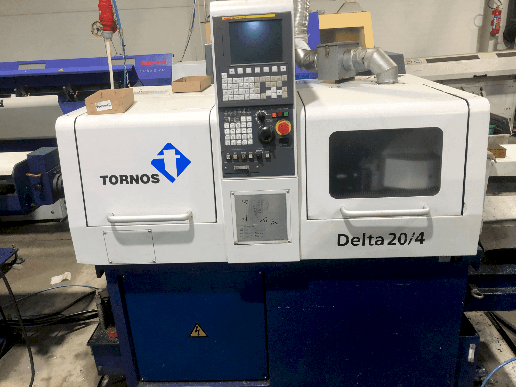 Вид станка TORNOS TORNOS DELTA 20/4 спереди