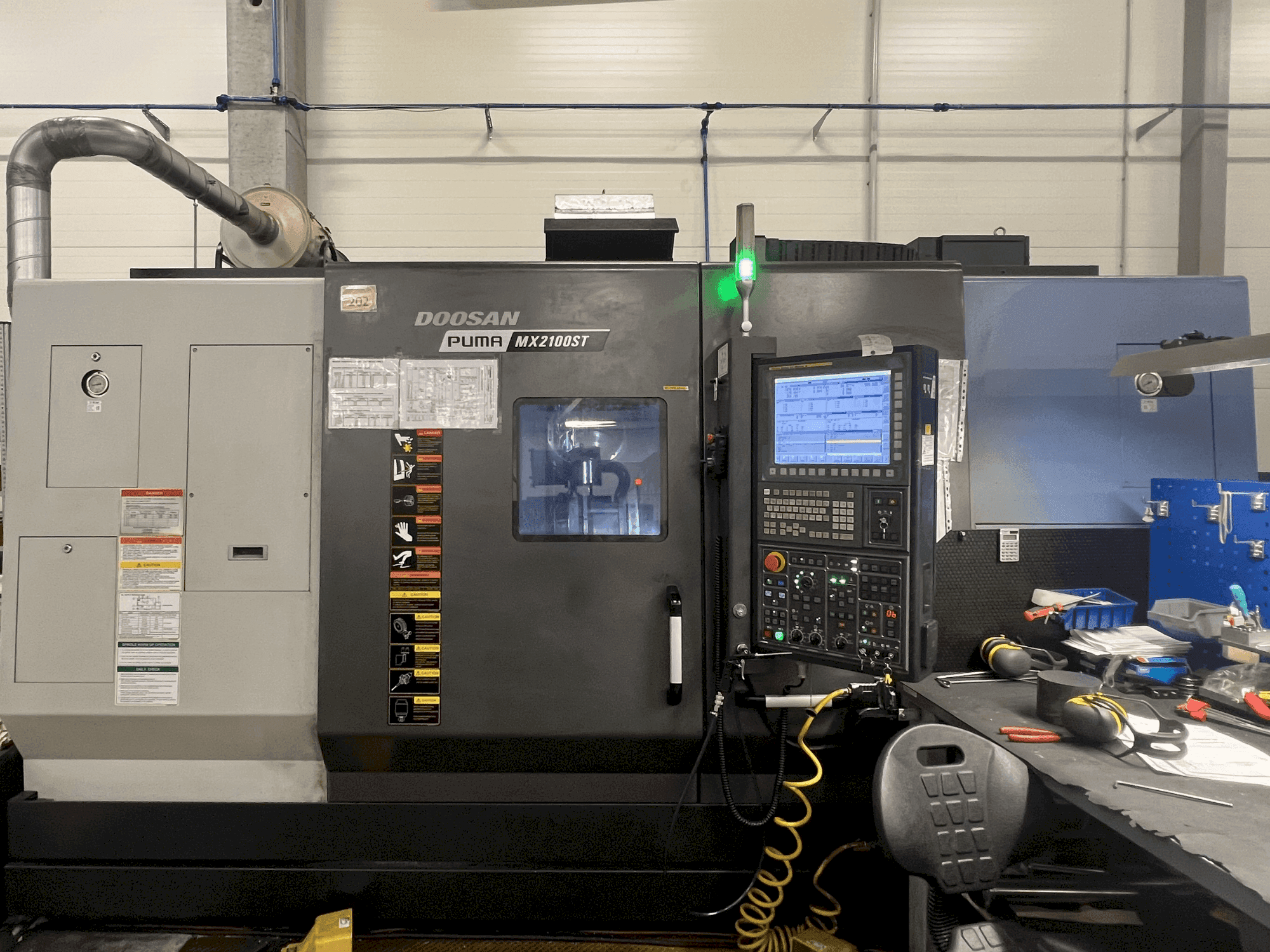 Вид станка DOOSAN MX2100ST спереди