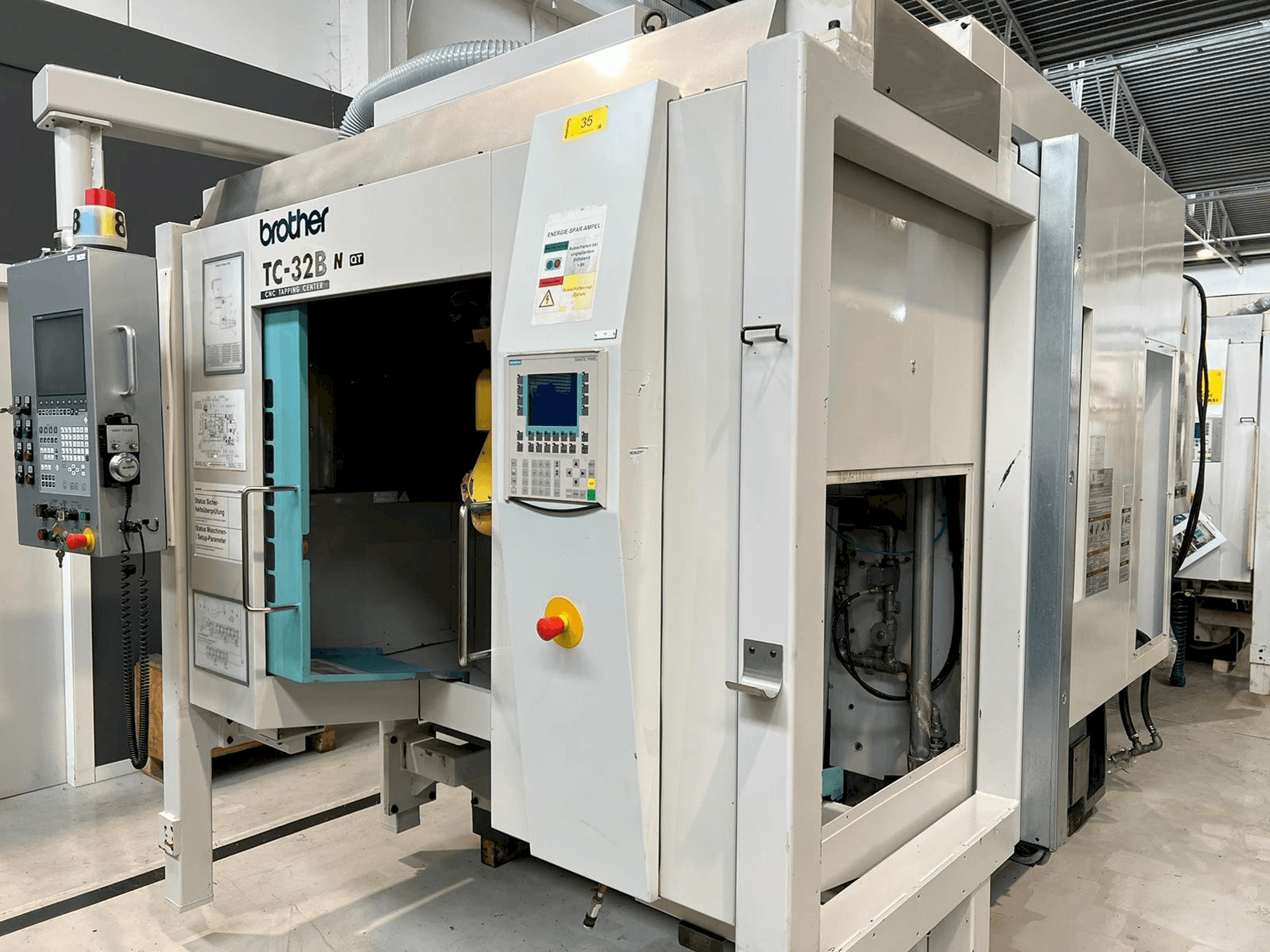 Вид станка Brother TC-32BN QT спереди