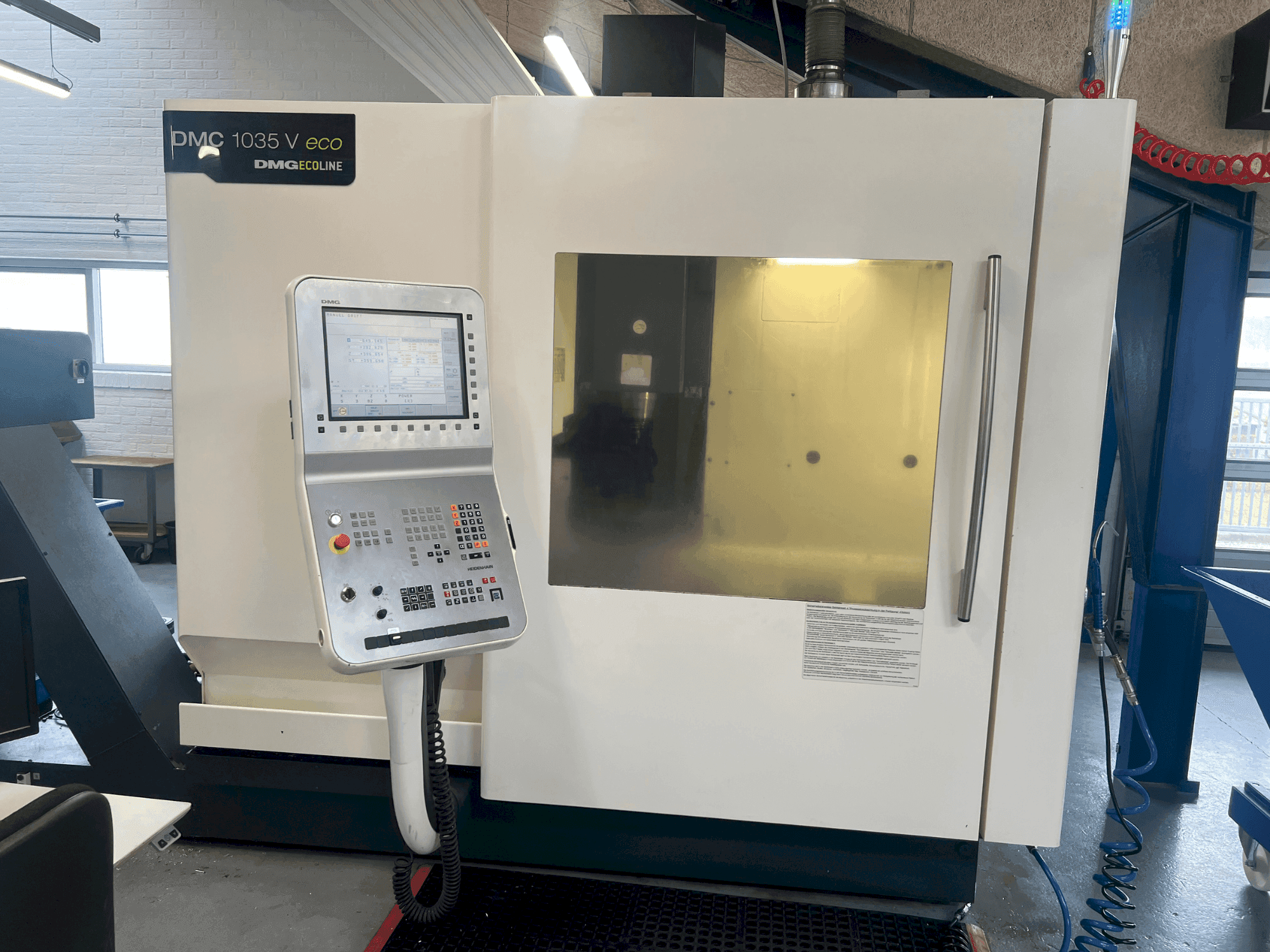 Вид станка DMG MORI DMC 1035V eco спереди