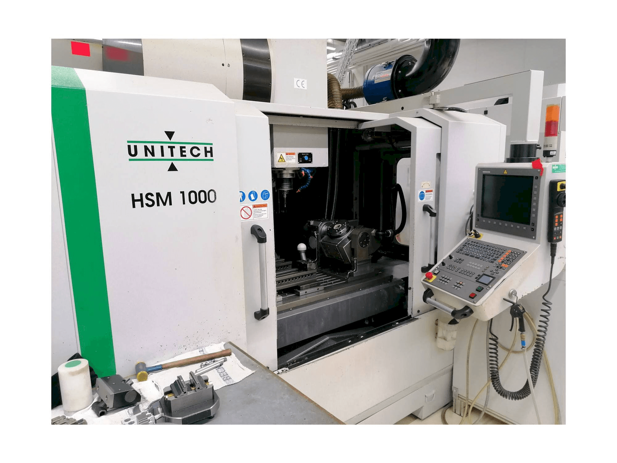 Вид станка UNITECH HSM1000 спереди