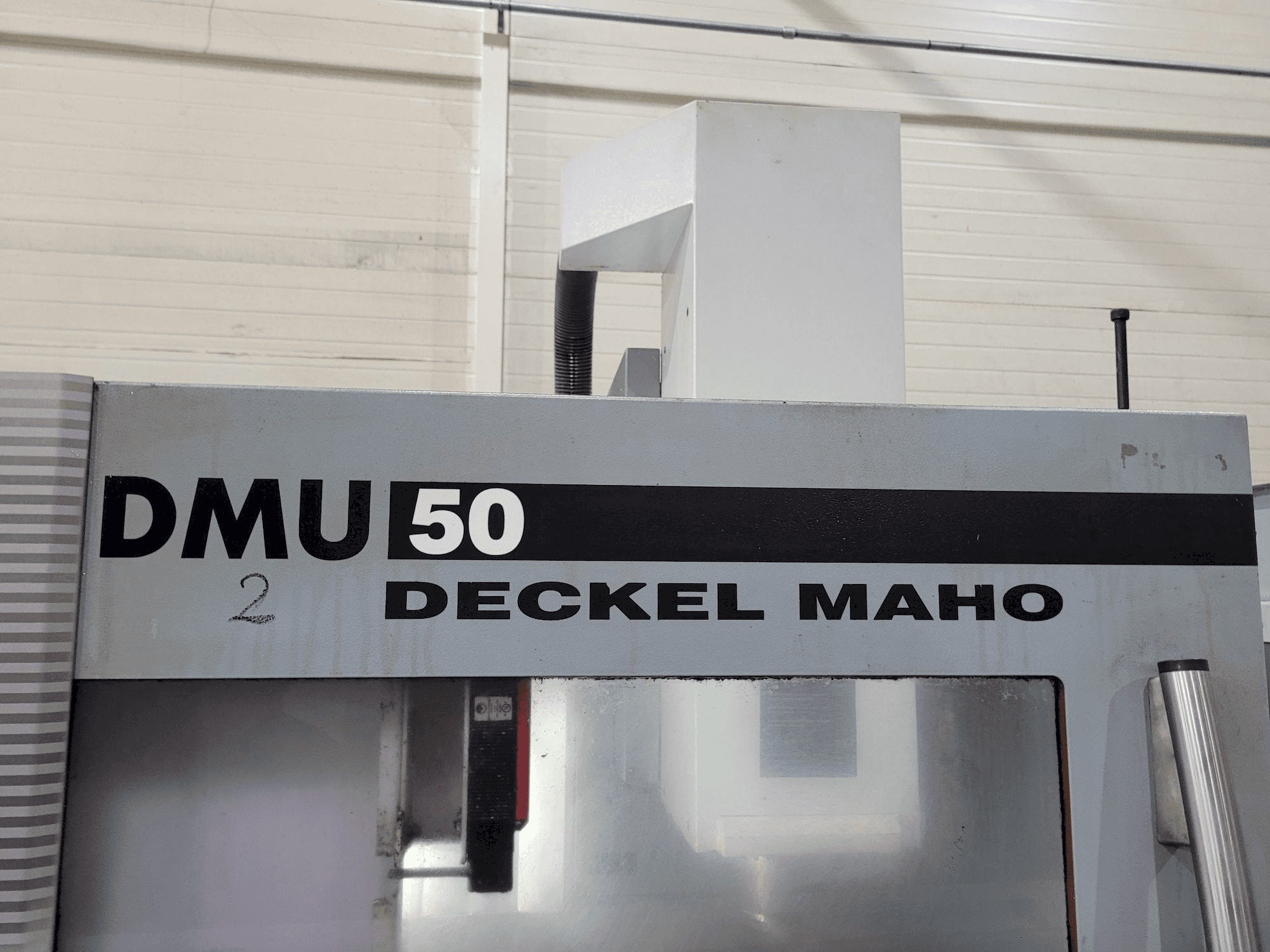 Вид станка DECKEL MAHO DMU 50 спереди
