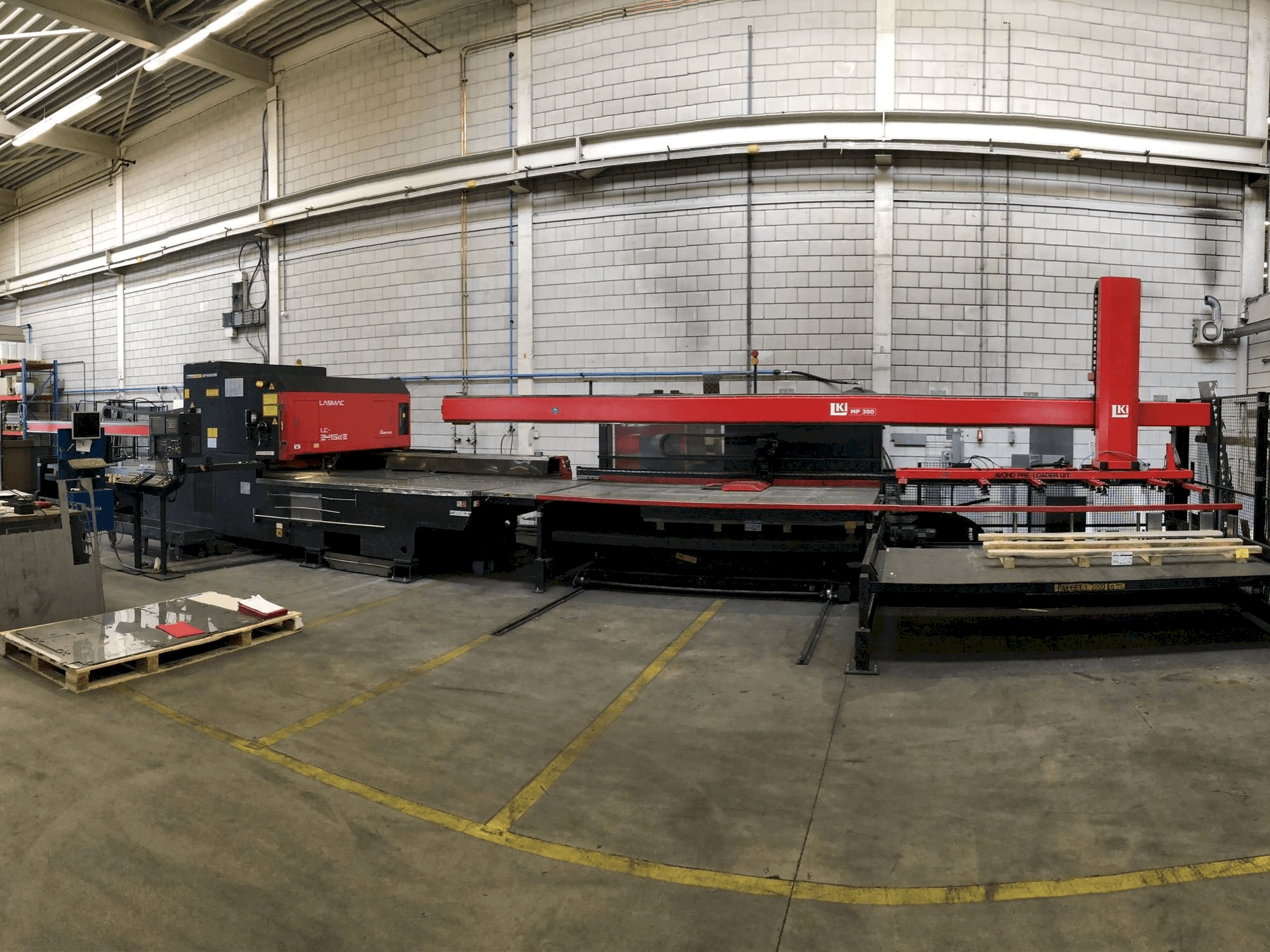 Front view of AMADA LC2415 ALPHA III machine